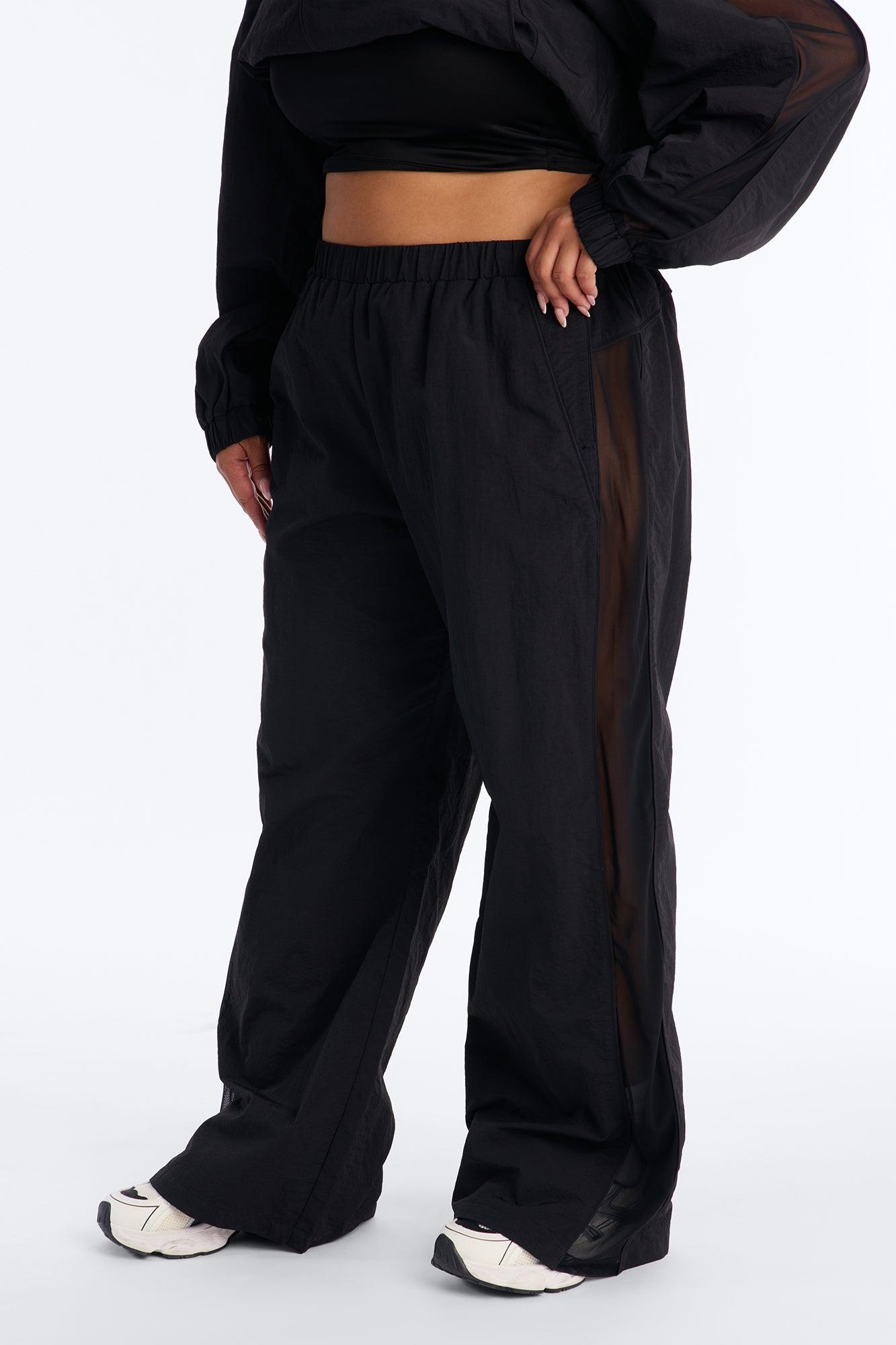 Airwave Motion Windbreaker Pant - Black Female Product Image