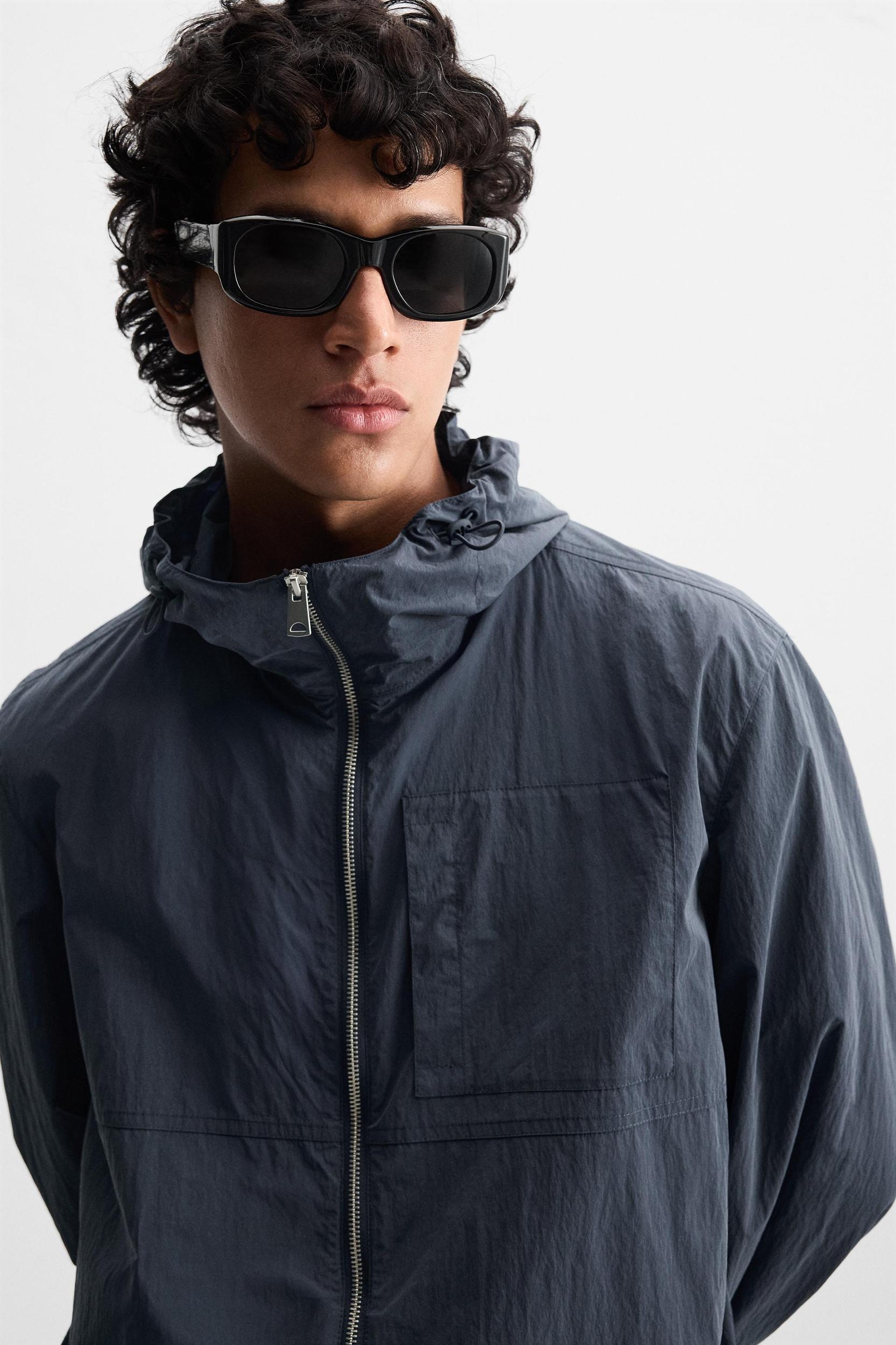 HOODED TECHNICAL JACKET Product Image