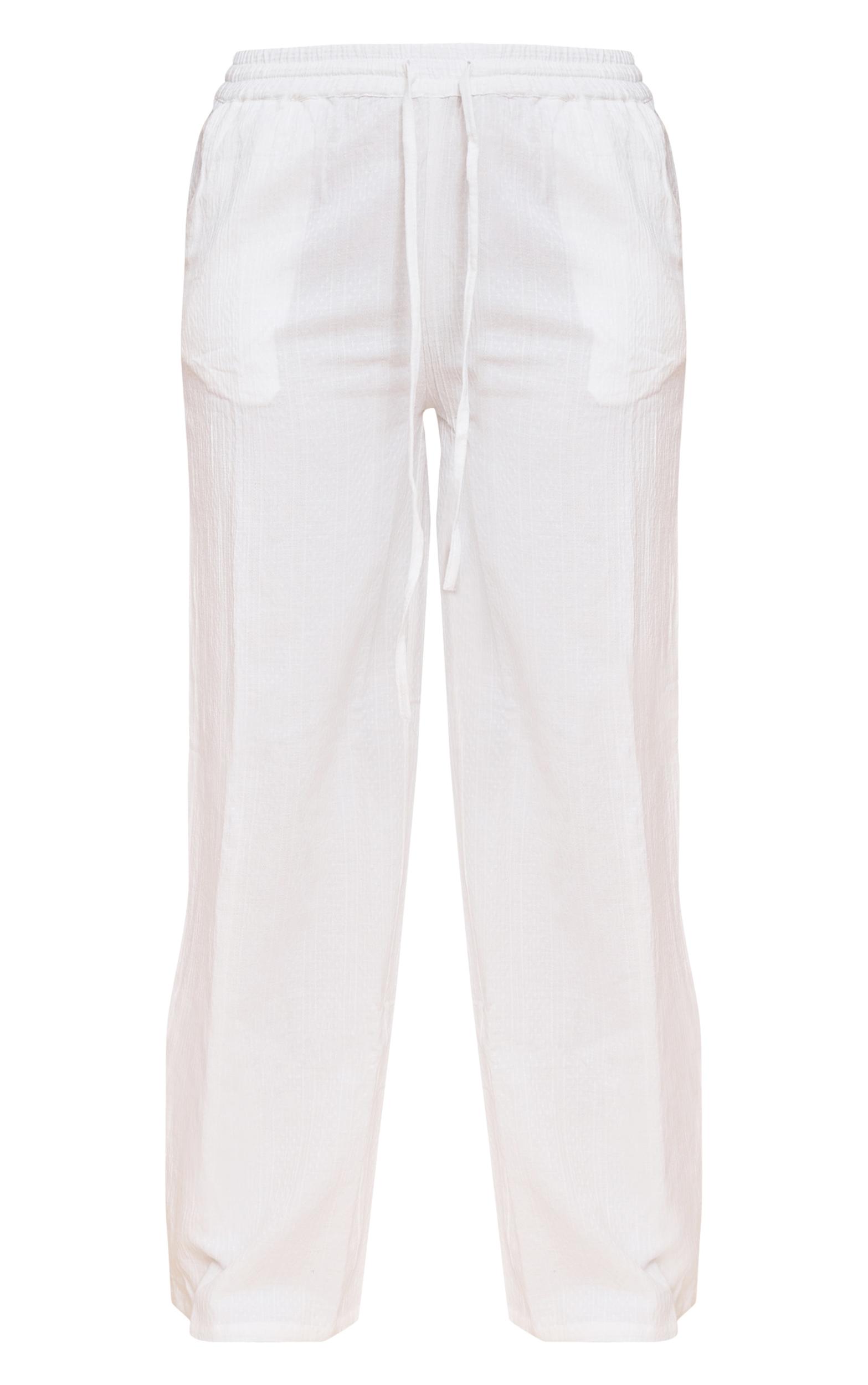 White Textured Mid Rise Wide Leg Pants Product Image