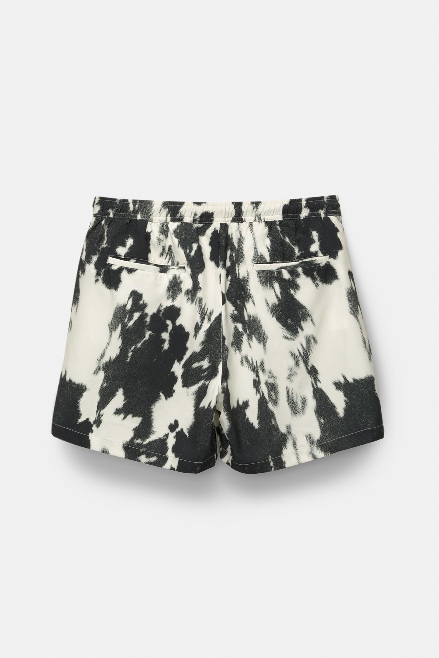 Cow animal print board shorts Product Image