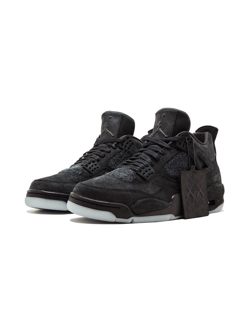 x Kaws Air Jordan 4 Retro "Black" sneakers Product Image