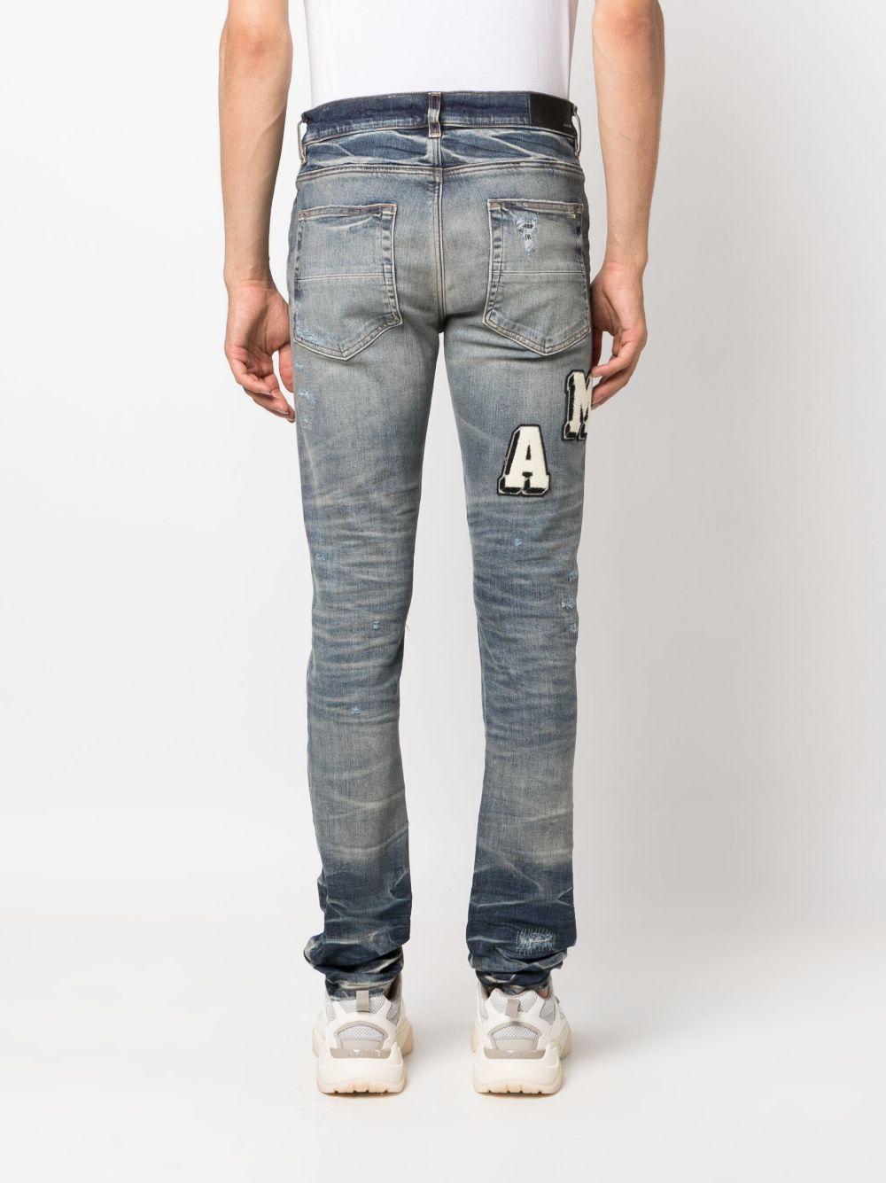 Varsity ripped skinny jeans Product Image