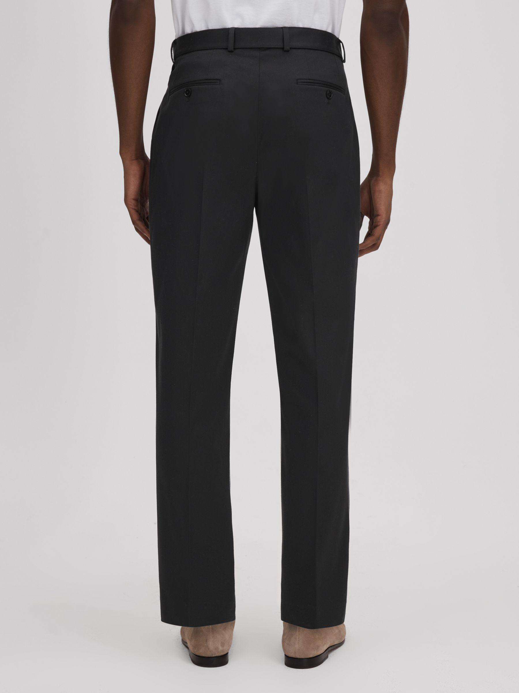 Relaxed Tapered Belted Trousers in Black Product Image