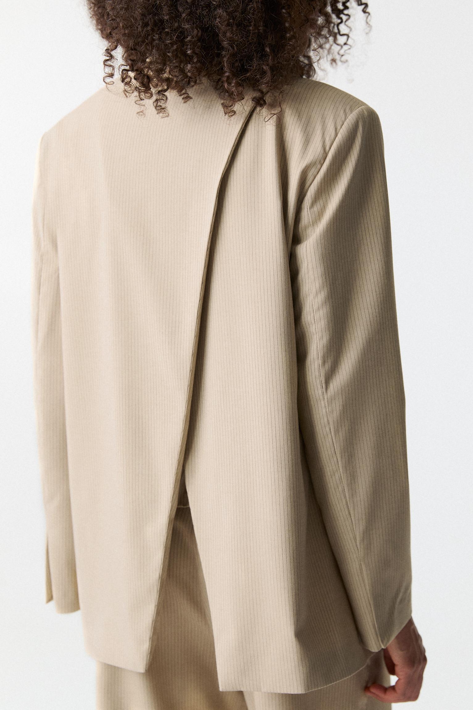 Asymmetric open back blazer Product Image