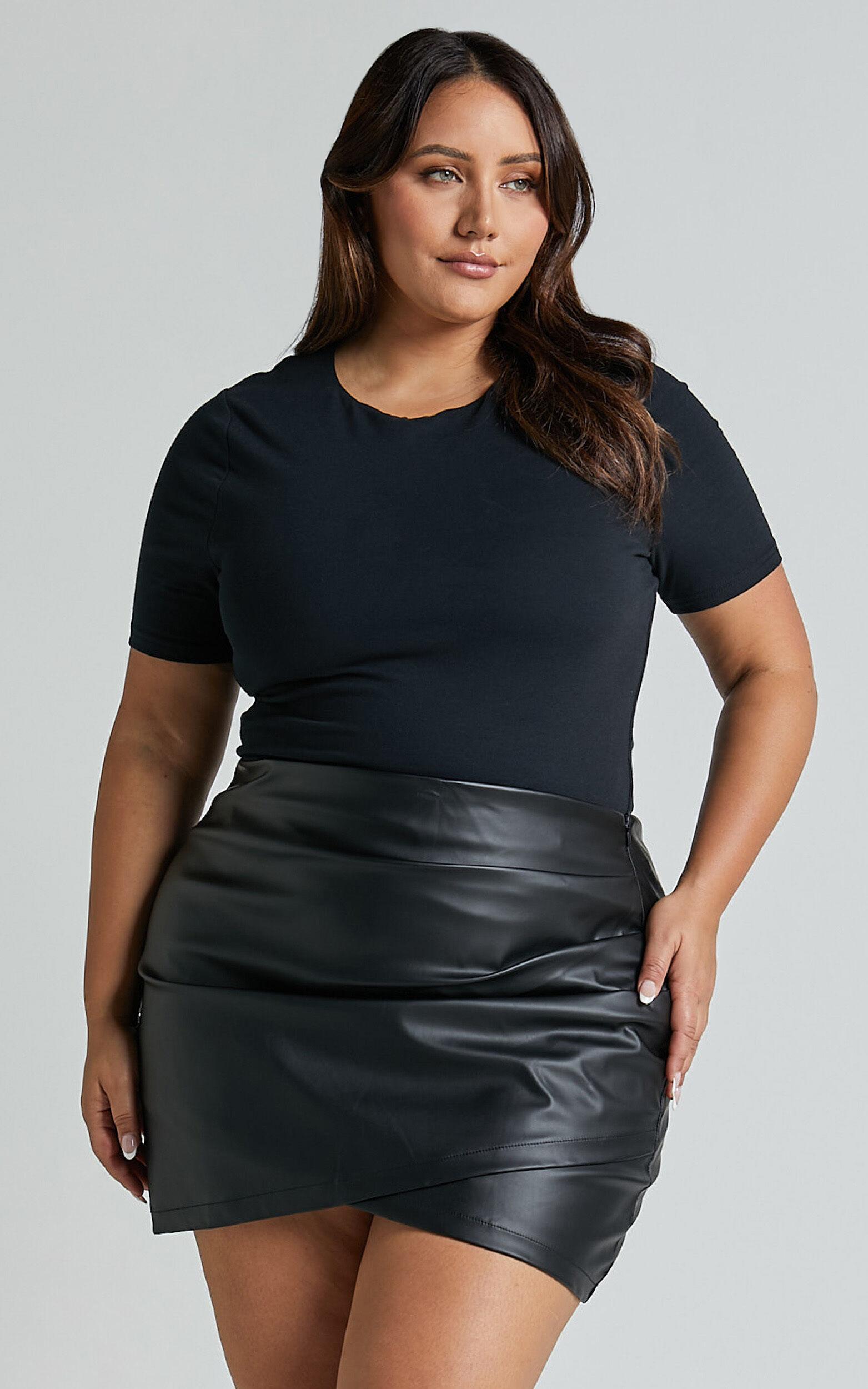 Ashlyn Mini Skirt - Faux Leather Overlap Skirt in Black Product Image