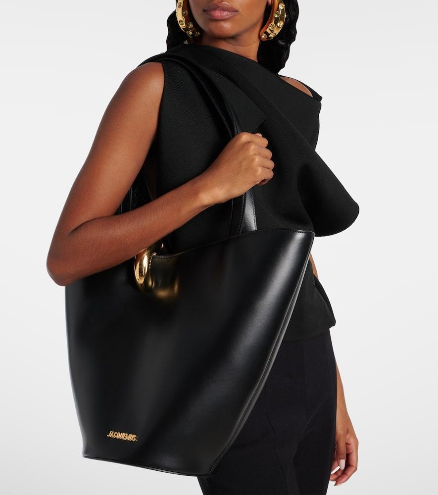 JACQUEMUS The Medium Bambola Asymmetric Leather Bucket Bag In Black 990 Product Image