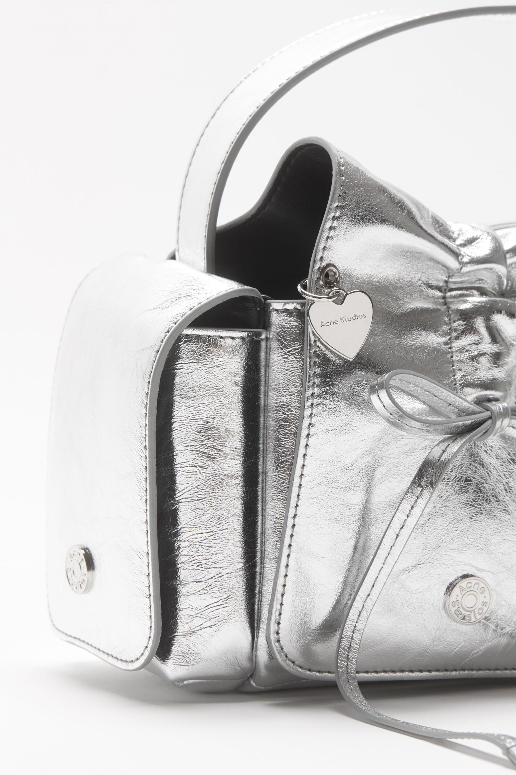 Multipocket metallic leather bag Product Image