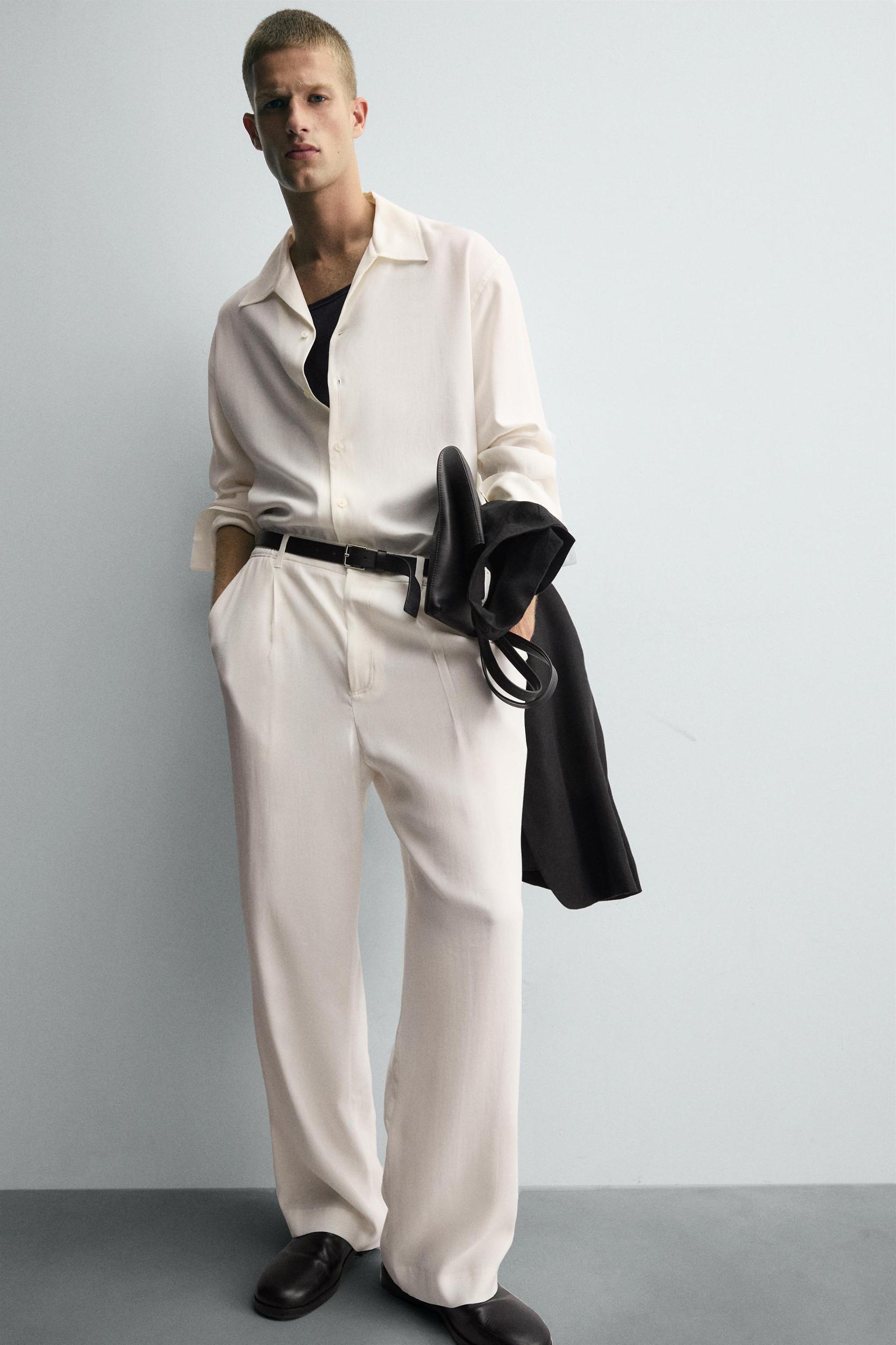 RELAXED FIT PLEATED PANTS Product Image