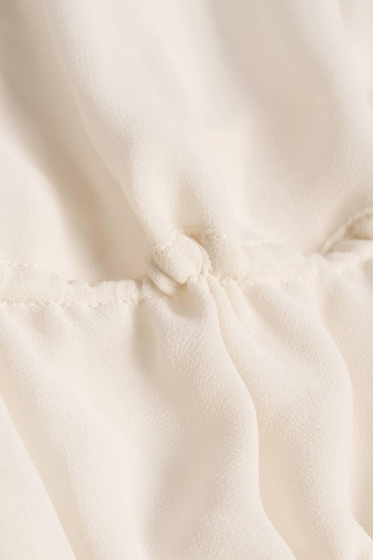 Cut-Out Semi-Sheer Ruched Halterneck Crop Top in Ivory Product Image