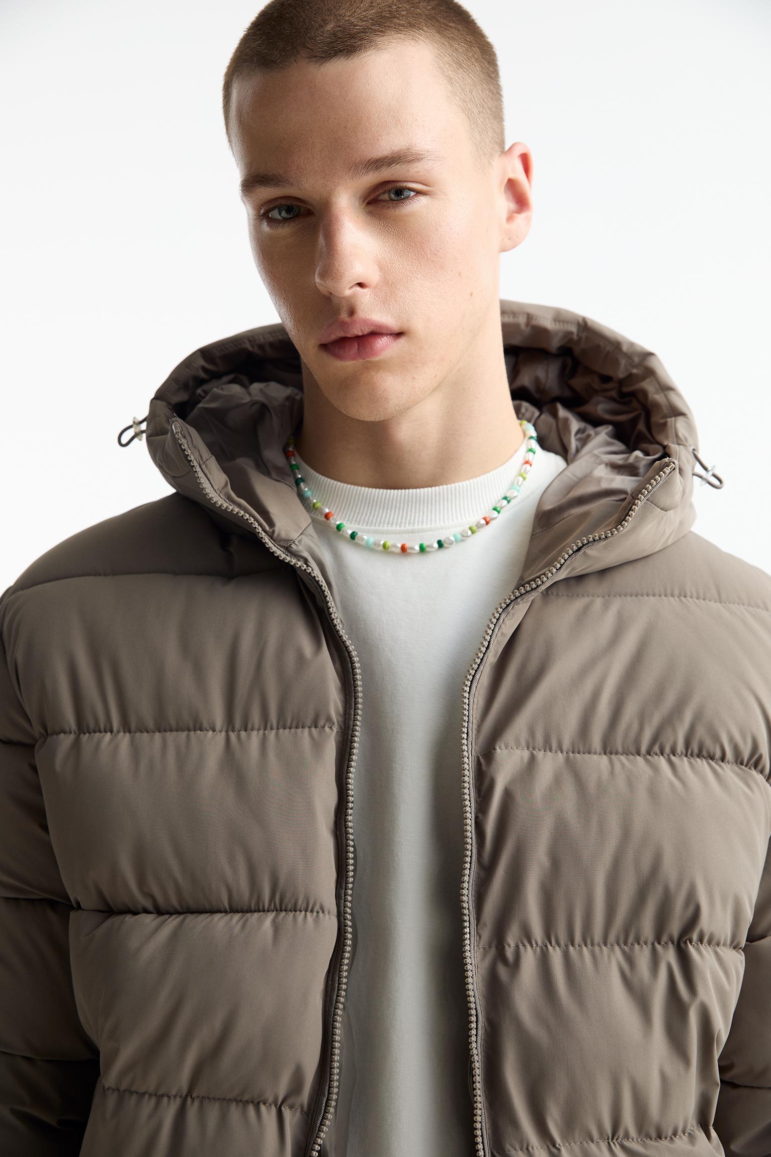 Lightweight puffer jacket with hood Product Image