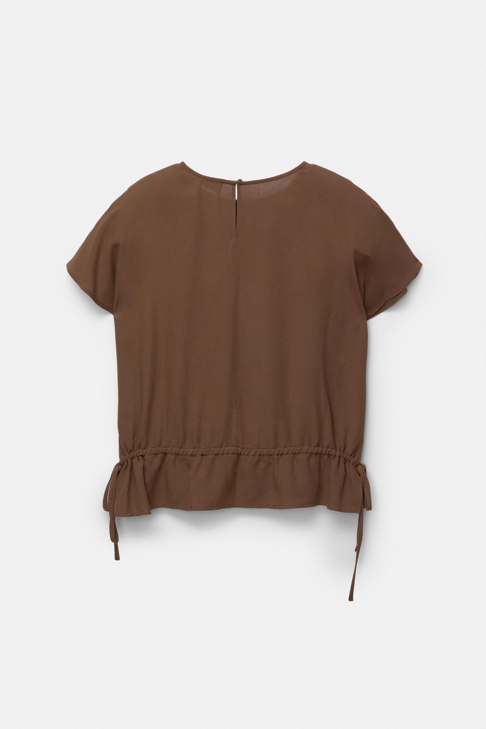 Top with ties at the waist Product Image