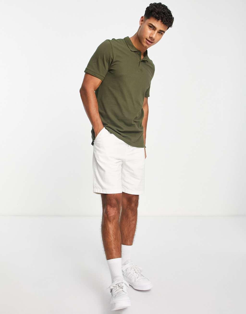 Jack & Jones Essentials slim fit pique logo polo in green Product Image