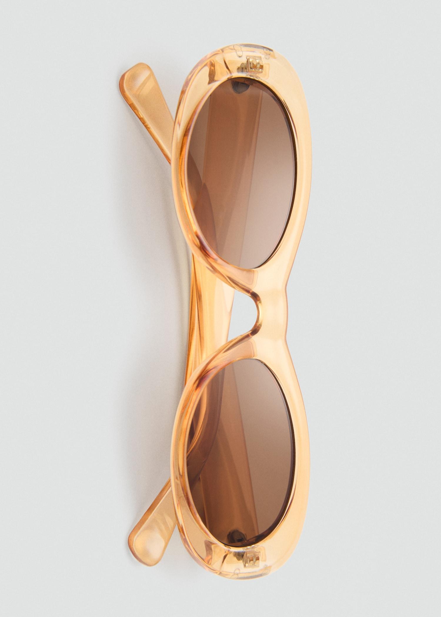 Oval-frame sunglasses - Women | MANGO USA Product Image