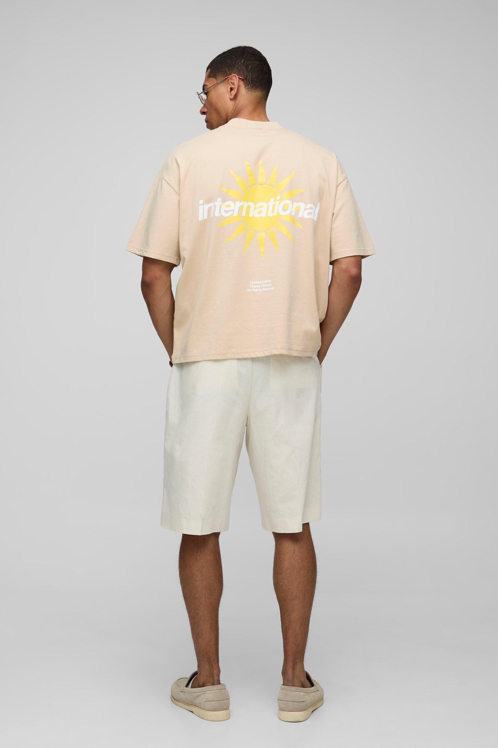 Oversized Boxy Extended Neck International Sun Slogan Print T-Shirt | boohooMAN USA Product Image