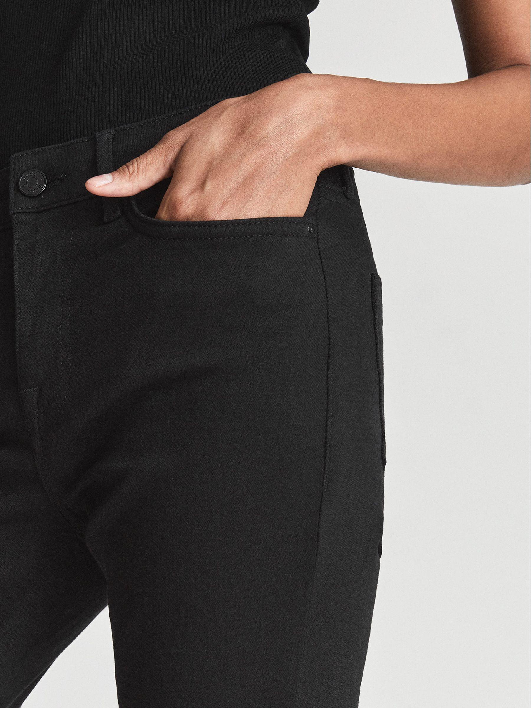 Mid Rise Skinny Jeans in Black Product Image