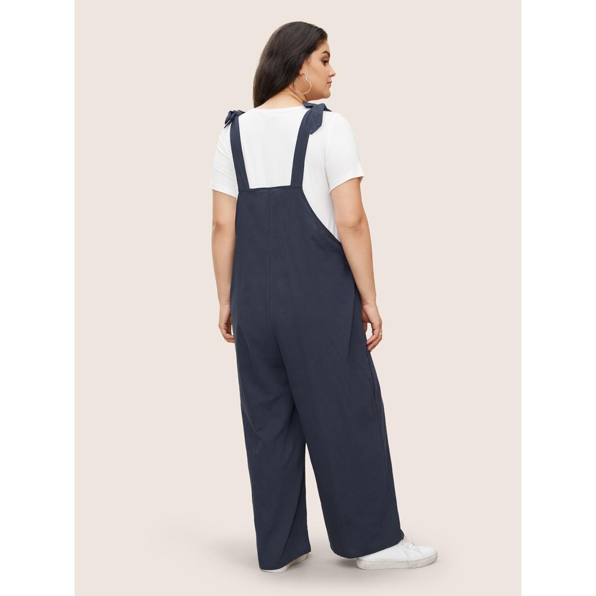 Plus Size Navy Solid Pleated Detail Pocket Knotted Shoulder Overall Jumpsuit Women Casual Sleeveless Non Everyday Loose Jumpsuits BloomChic 26/4X Product Image