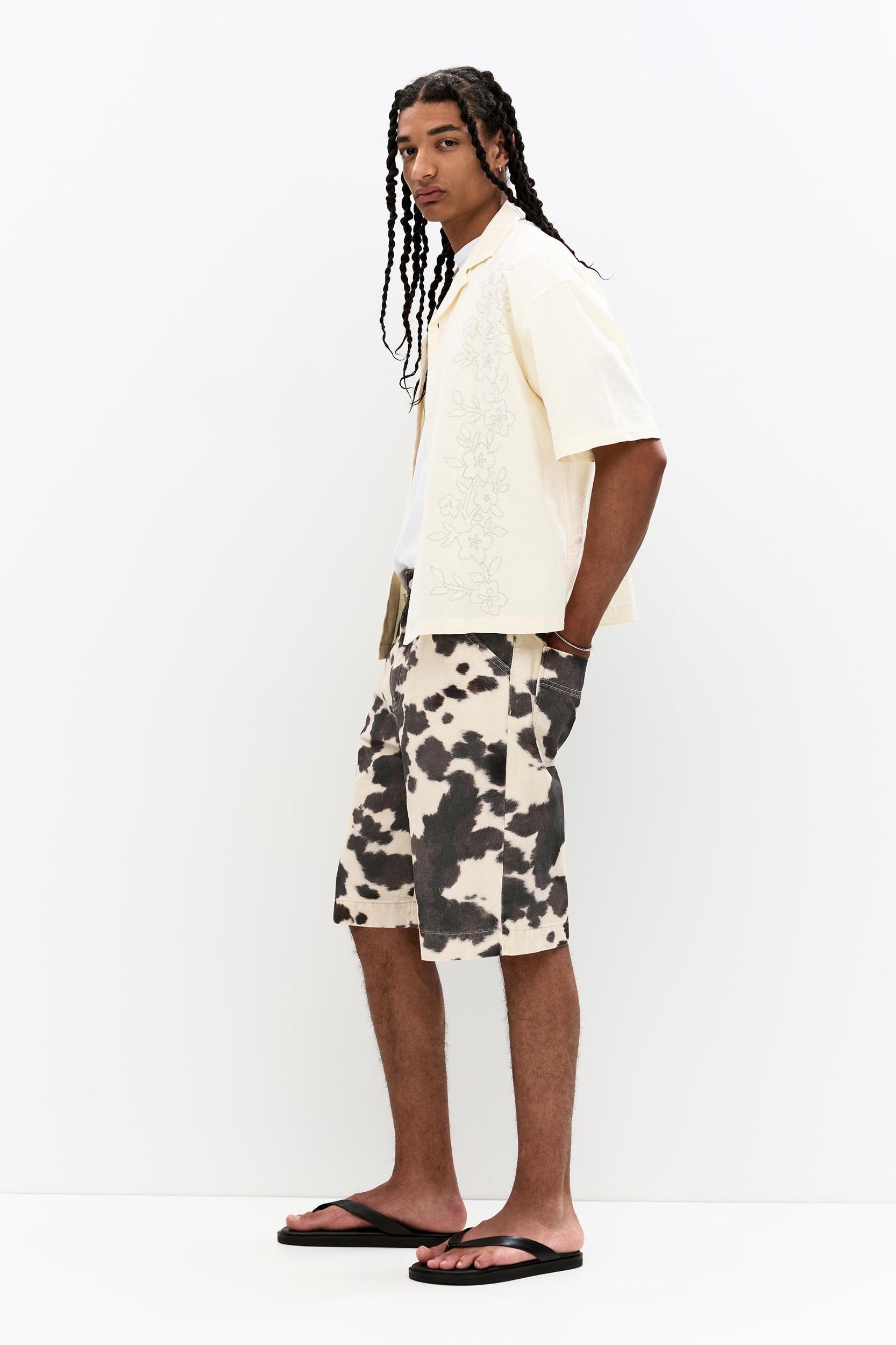 Animal print cow baggy Bermuda shorts Product Image