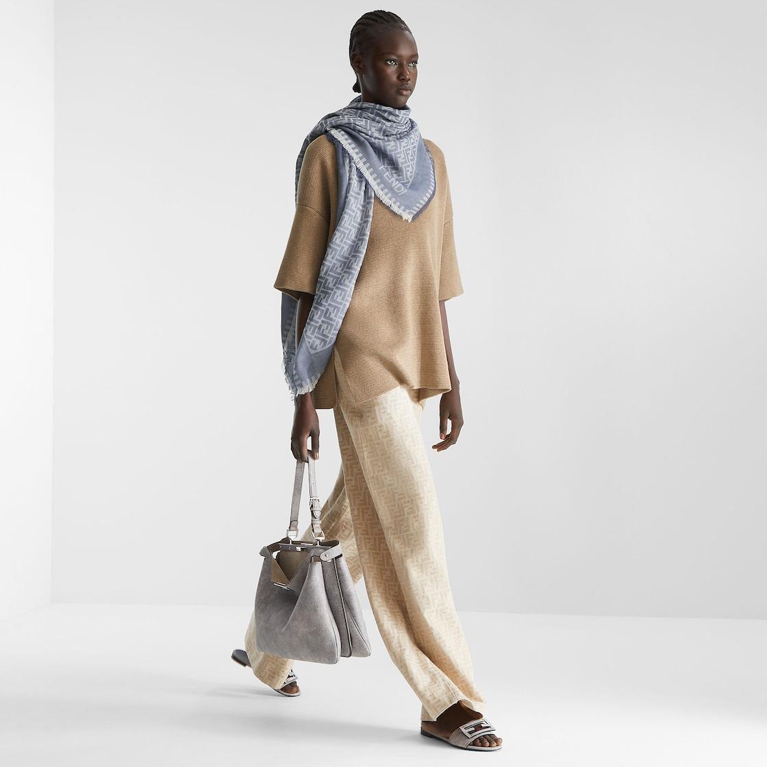 Peekaboo Soft LargeGray leather bag with a faded denim effect. Product Image