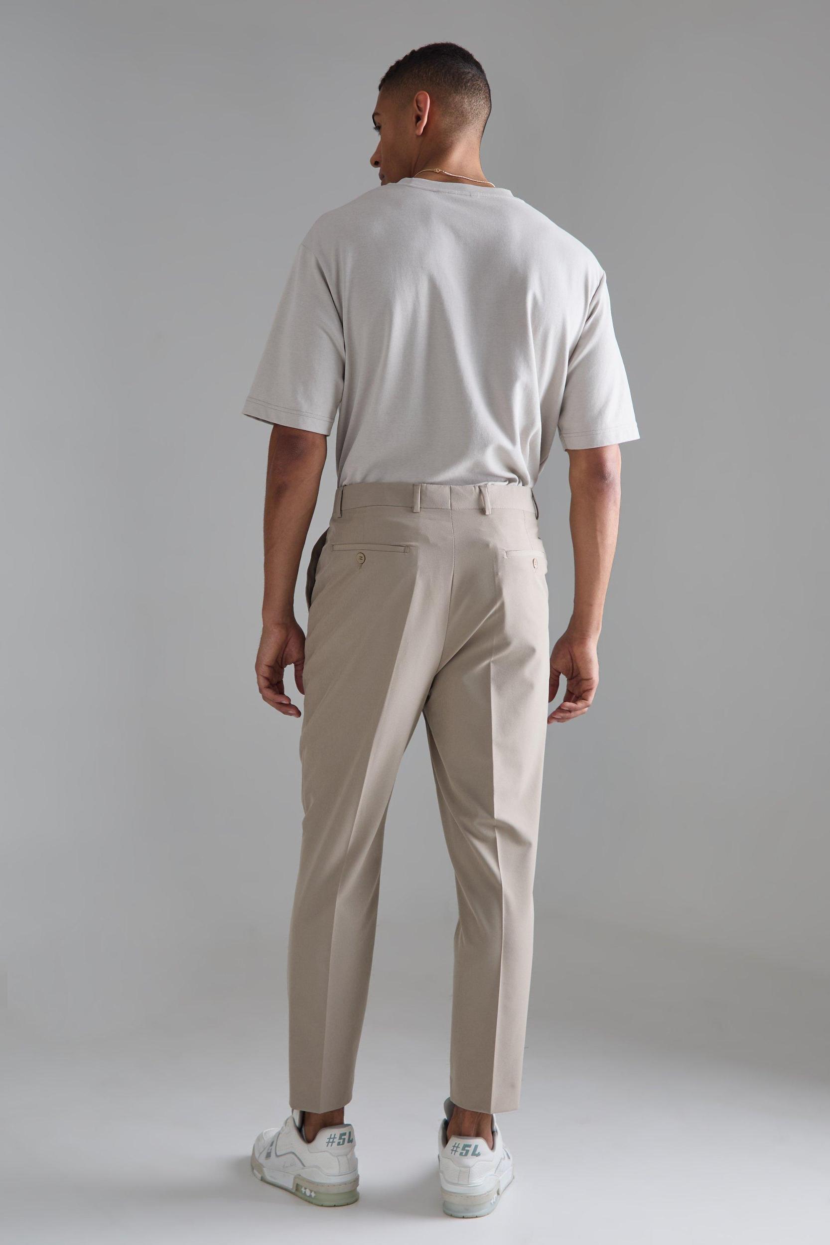 High Rise 4 Way Stretch Tapered Pants | boohooMAN USA Product Image