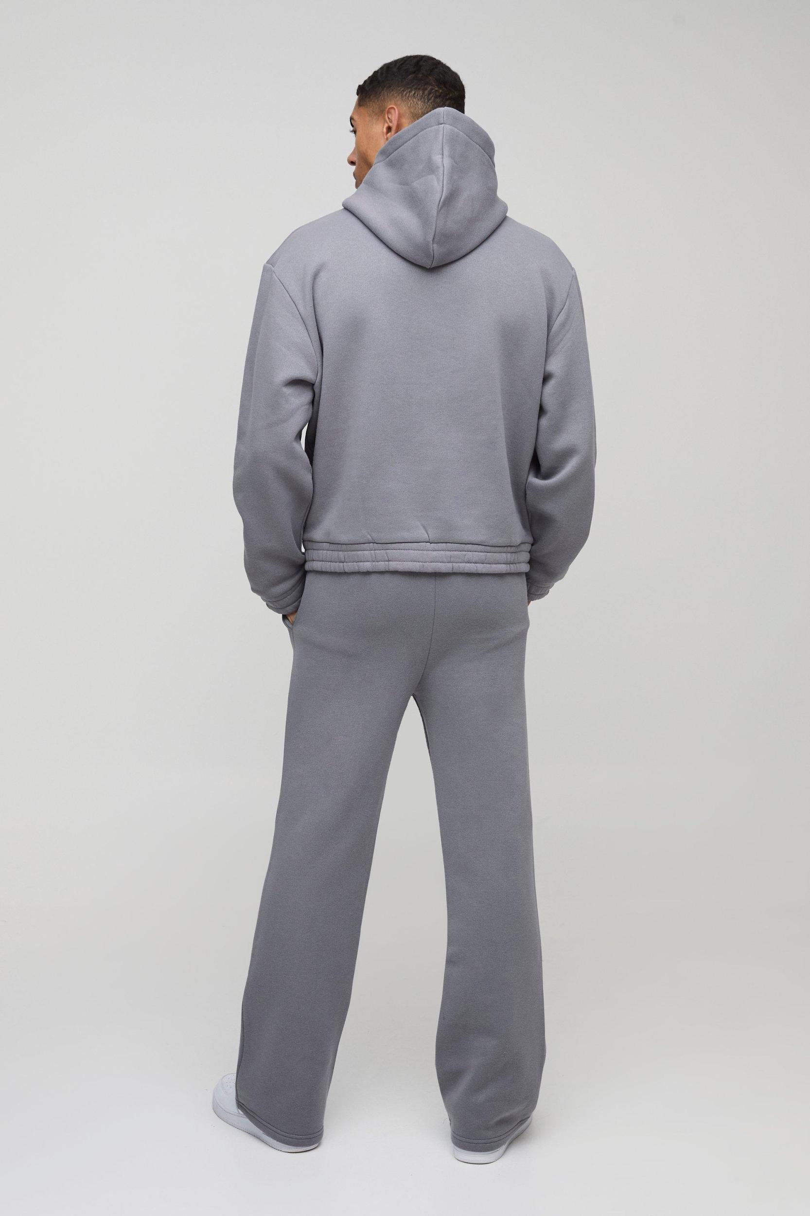 Oversized Boxy Flare Stacked Hooded Tracksuit With Rubber Badge | boohooMAN USA Product Image