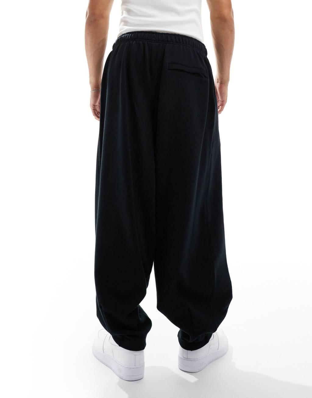 Nike Club french terry oversized joggers in black Product Image