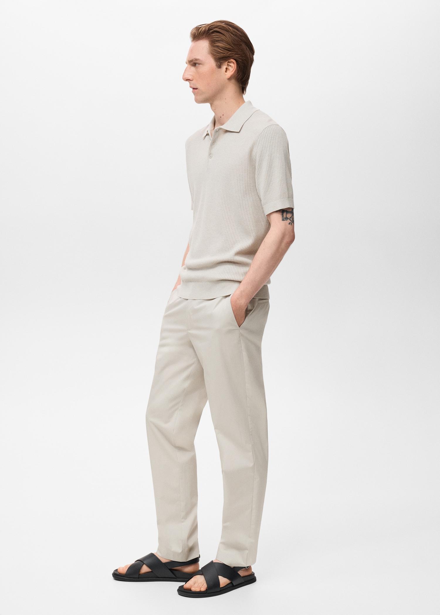 Ribbed knit polo shirt - Men | MANGO USA Product Image