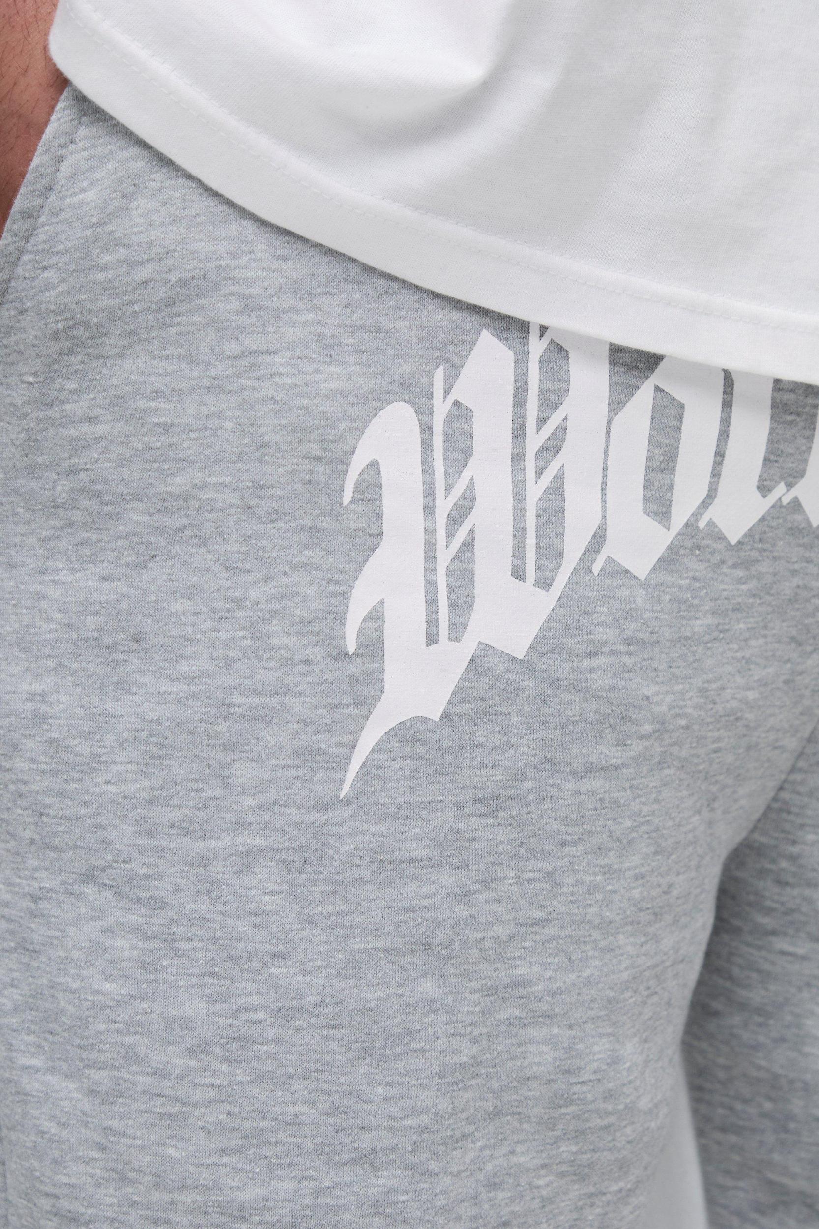 Plus Worldwide Cross Print Flared Gusset Sweatpants | boohooMAN USA Product Image