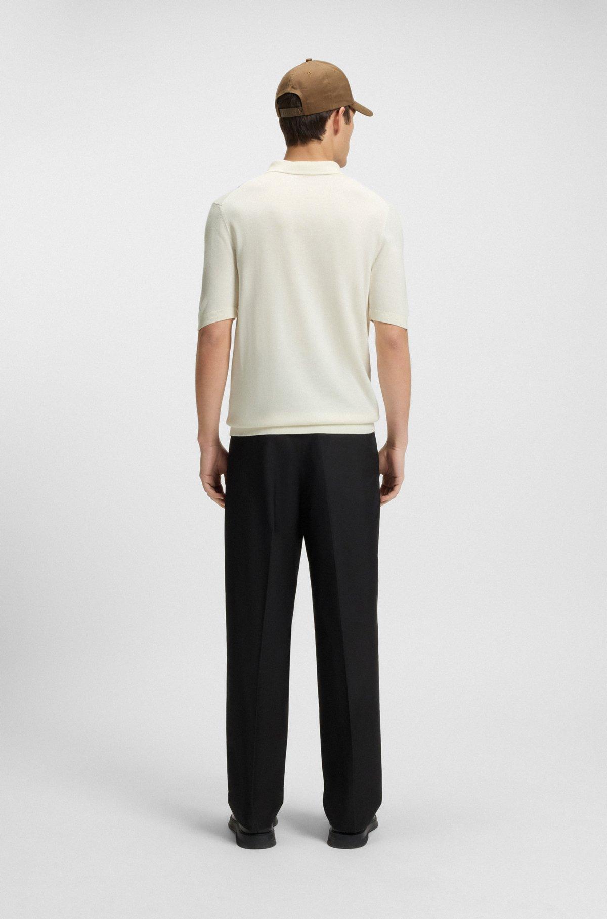 Zip-neck polo sweater with vertical stripes Product Image