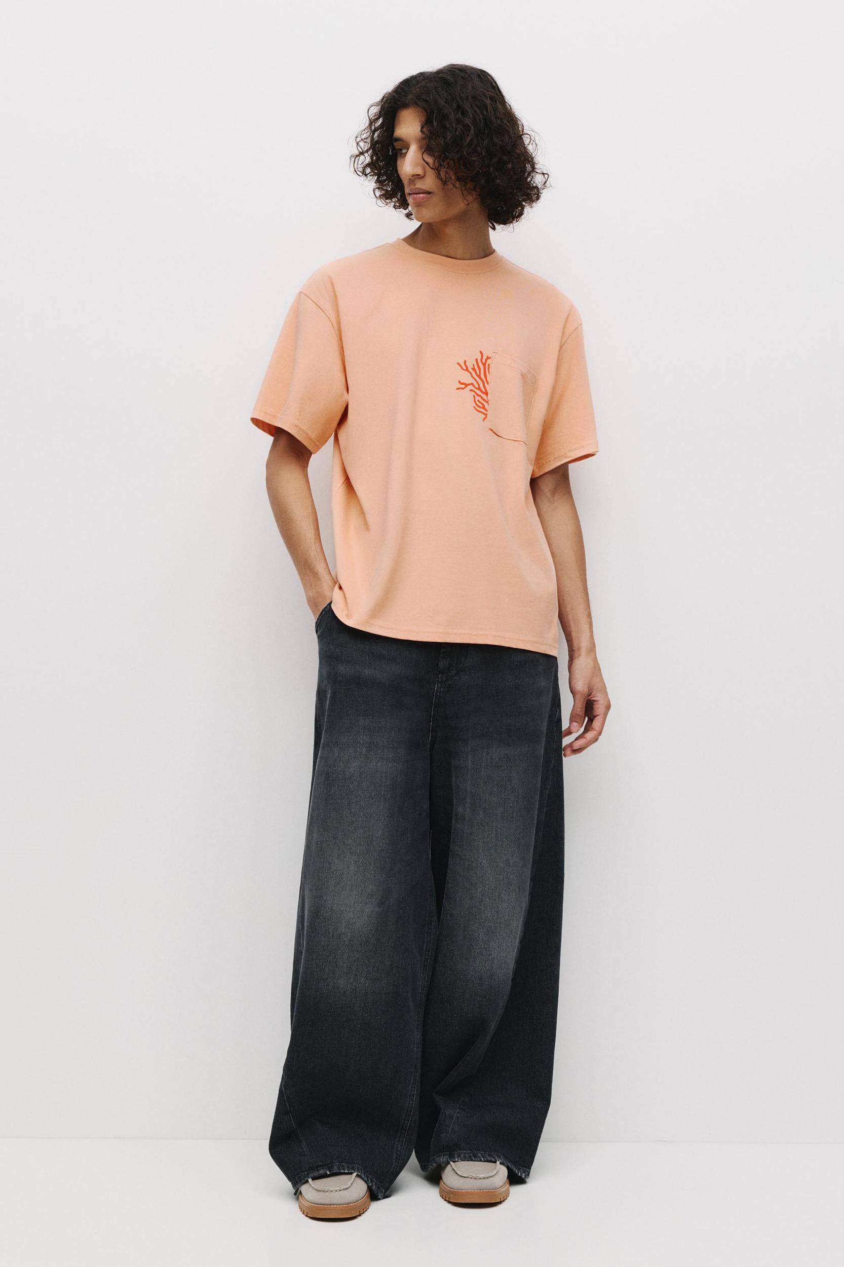 Orange T-shirt with pocket Product Image