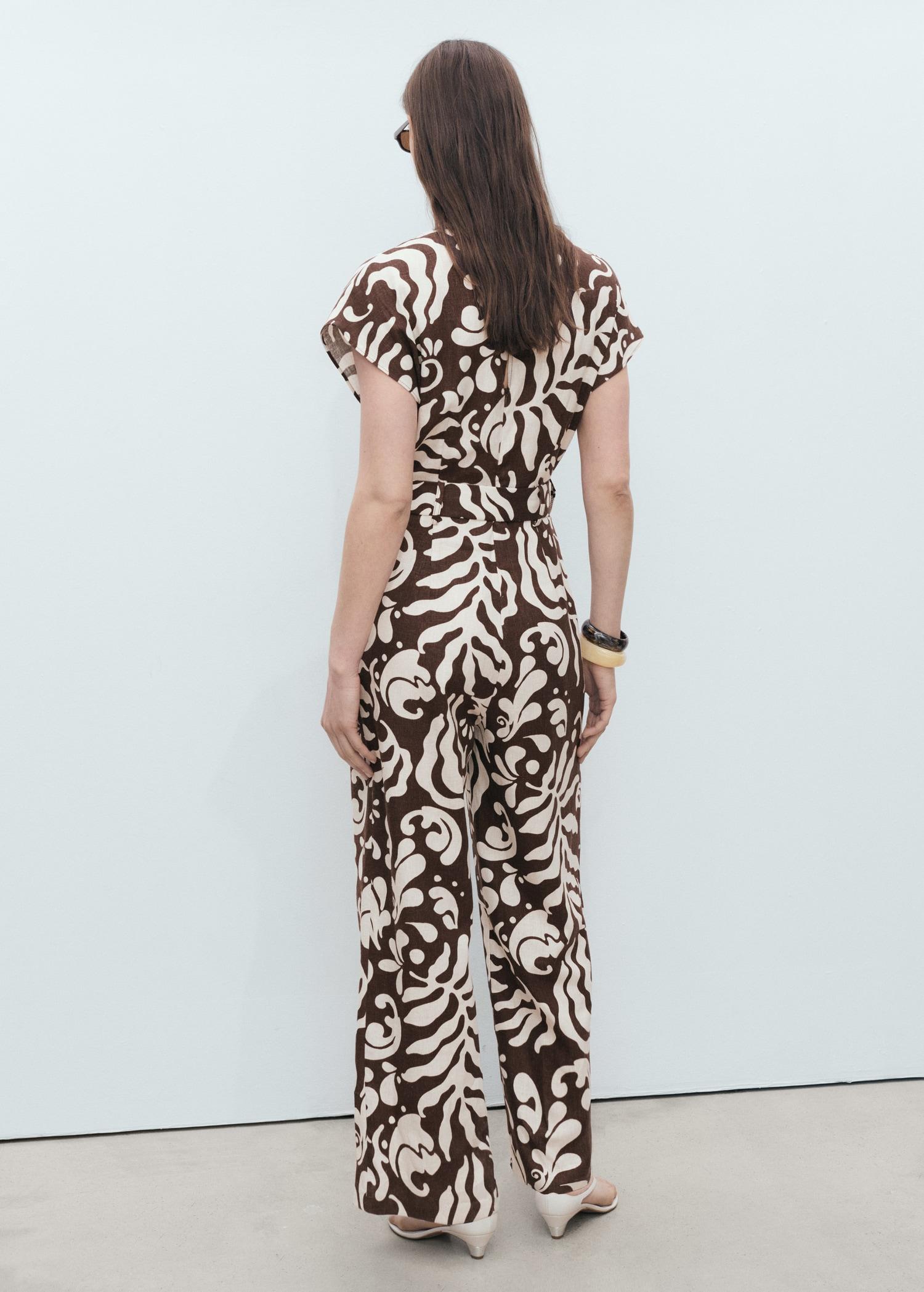 Printed linen jumpsuit with belt - Women | MANGO USA Product Image
