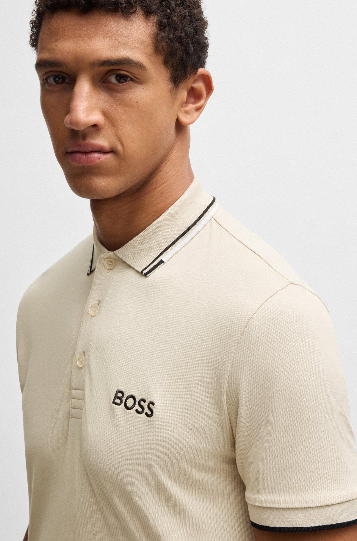 Polo shirt with contrast logos Product Image
