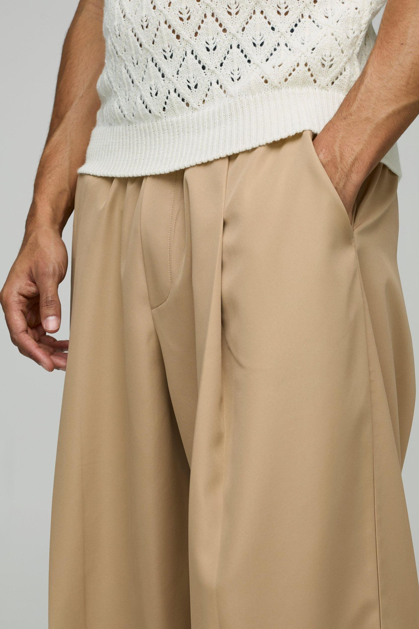 Elasticated Waist Balloon Fit Pleated Front Pants | boohooMAN USA Product Image