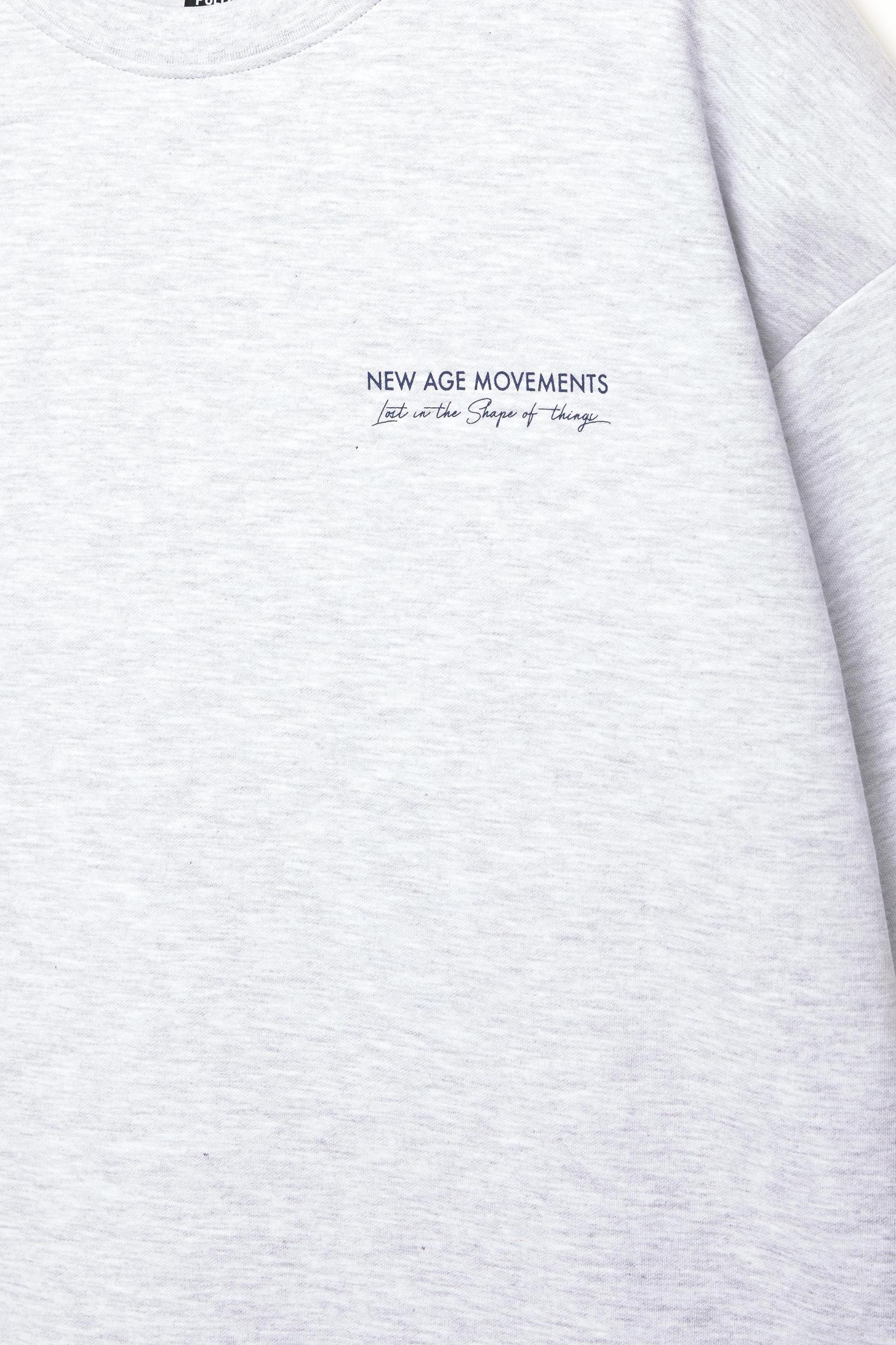 Short sleeve sweatshirt with graphic and slogan Product Image