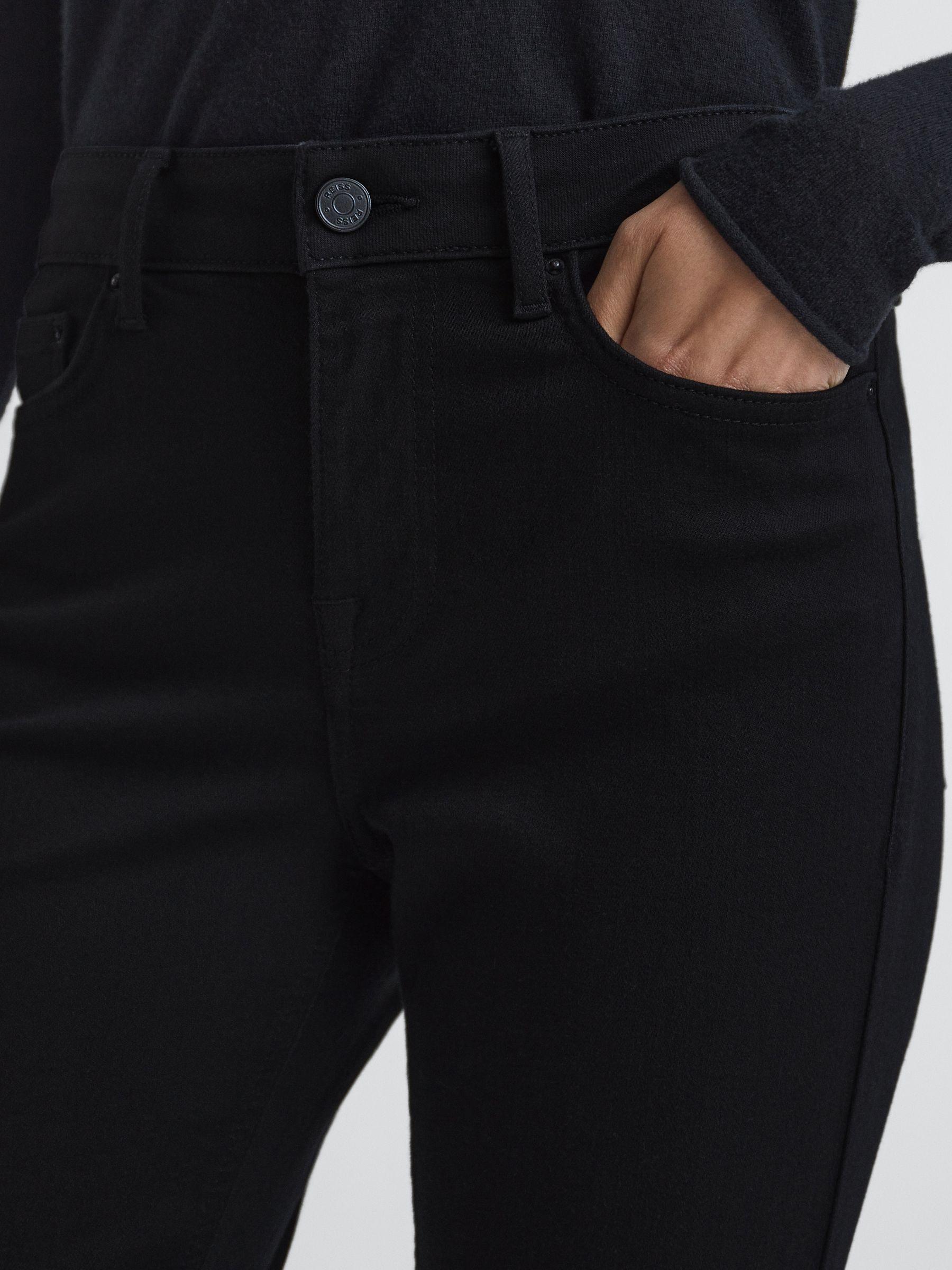 Mid Rise Skinny Jeans in Black Product Image