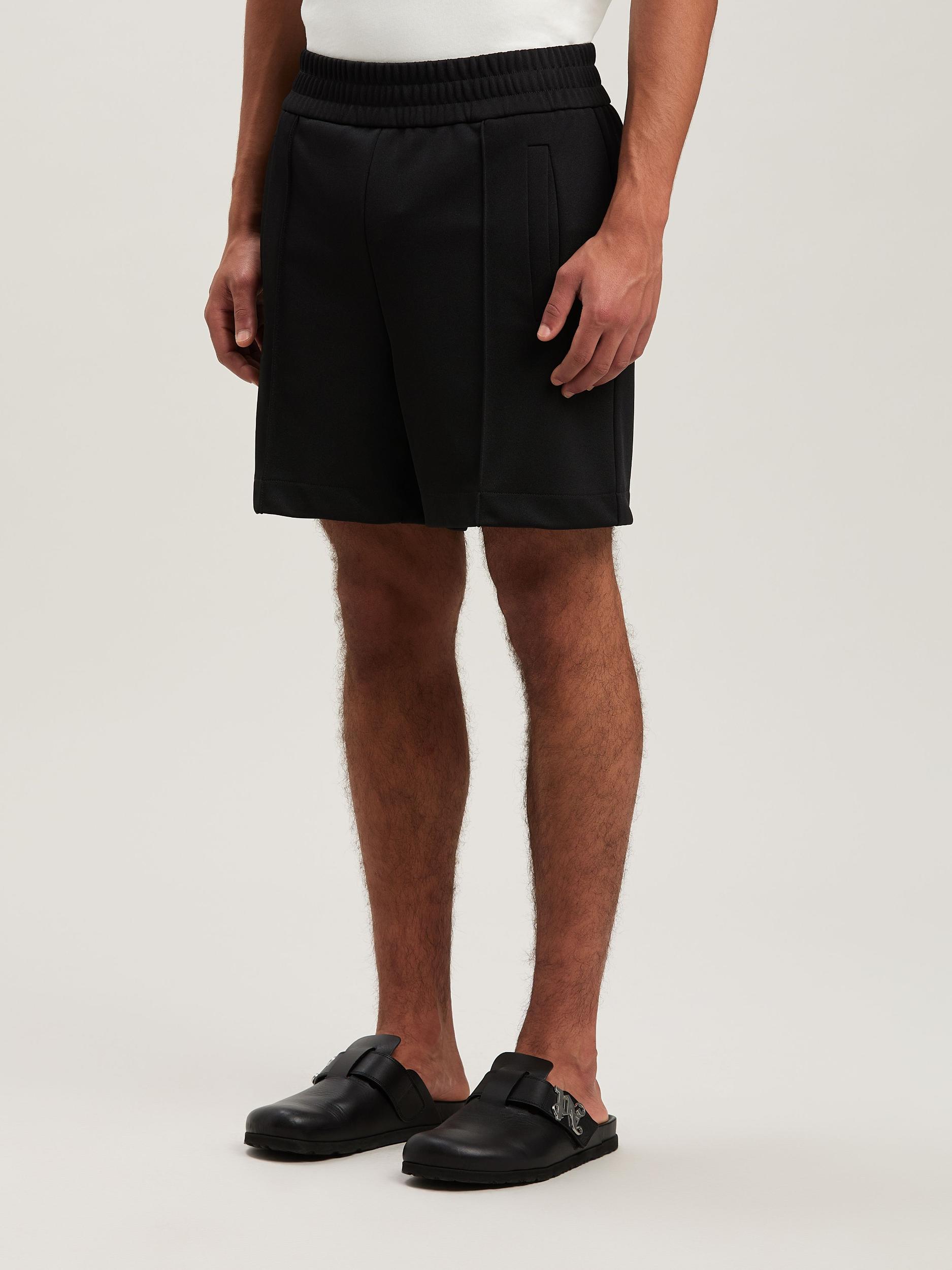 BACK CURVED LOGO TRACK SHORTS BLACK - OF Product Image
