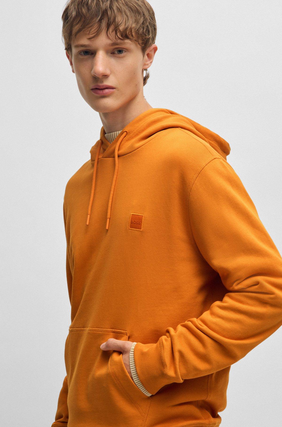 Cotton-terry hoodie with logo patch Product Image