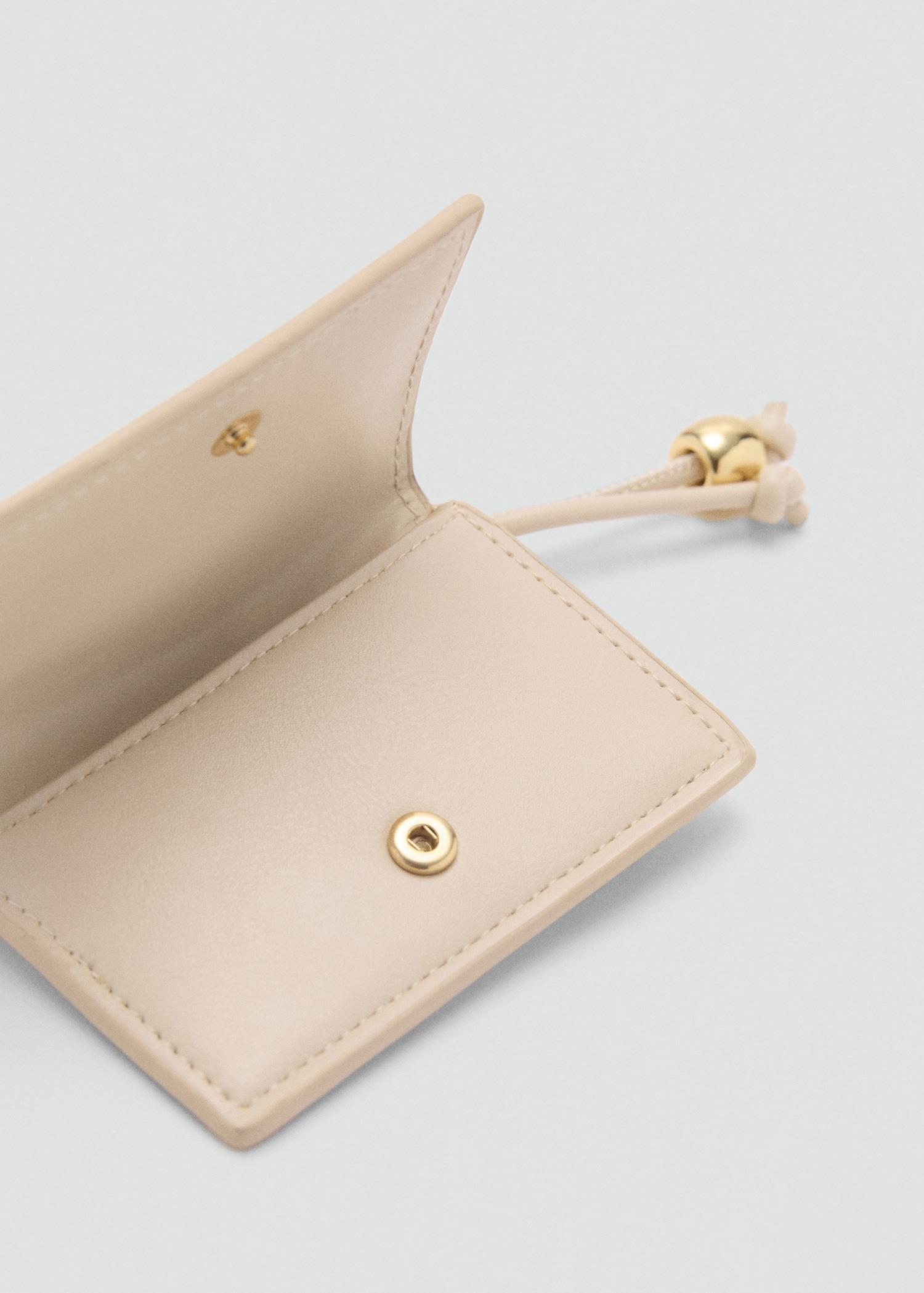 Leather-effect purse with bead detail - Women | MANGO USA Product Image