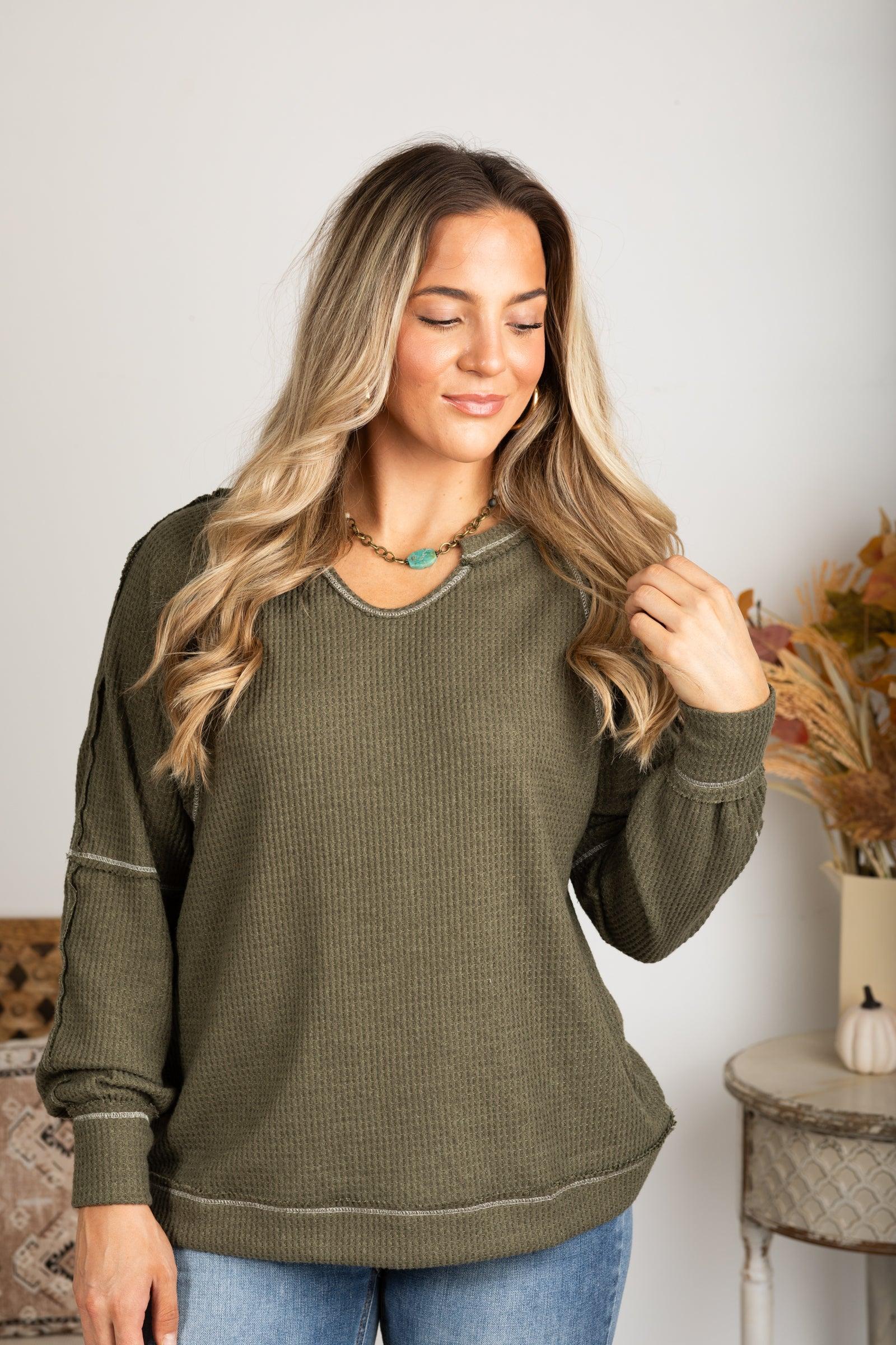 Notched Neck With Exposed Seams Knit Top Product Image