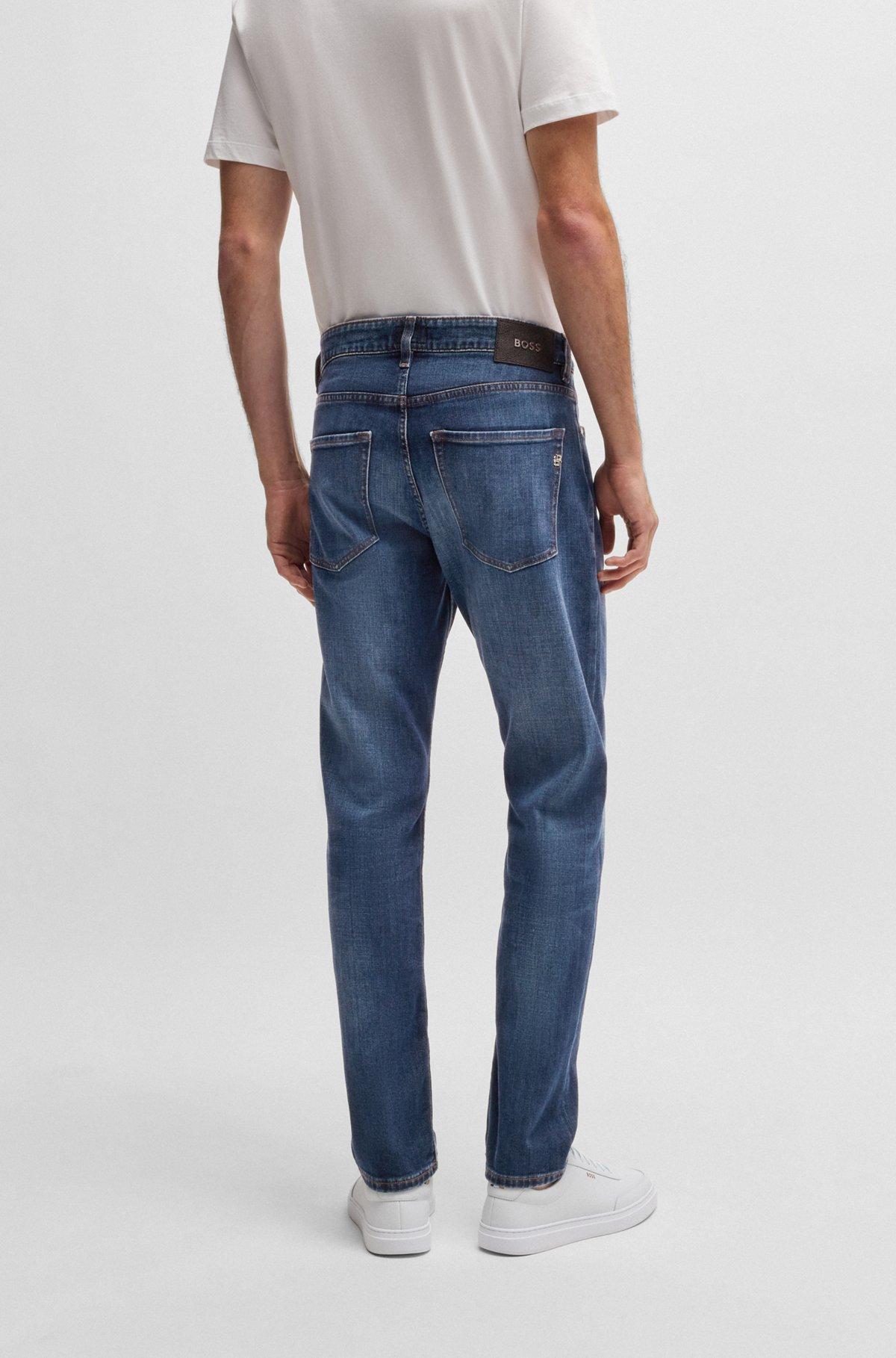 Delaware slim-fit jeans in blue comfort-stretch denim Product Image