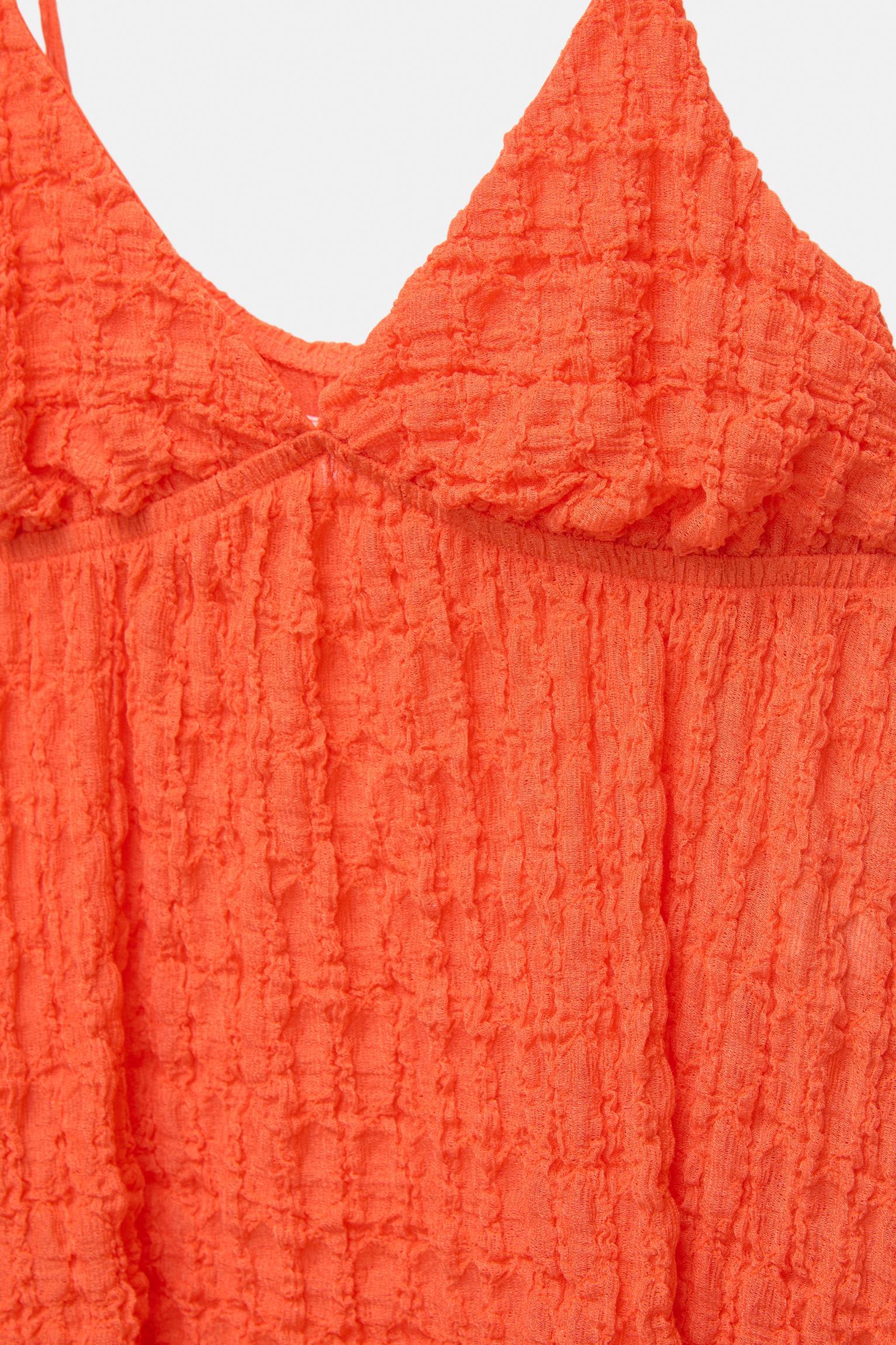 Textured strappy top Product Image