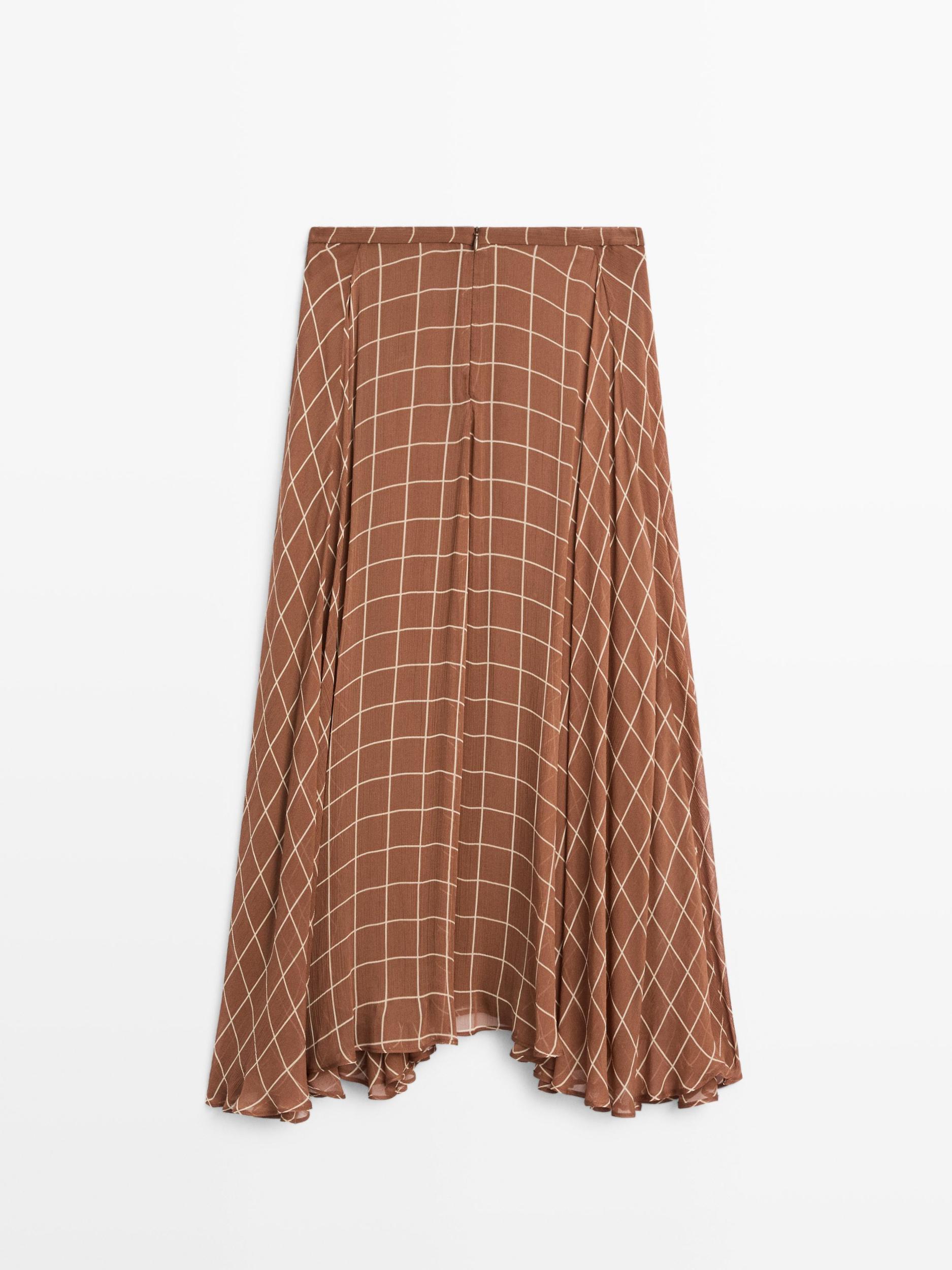 Long flowing skirt with checked detail Product Image