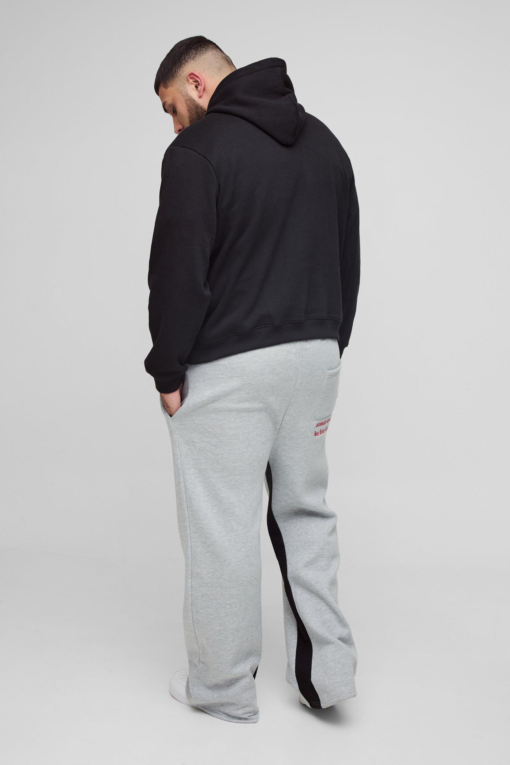Plus Official Embroidery Relaxed Flare Sweatpants | boohooMAN USA Product Image