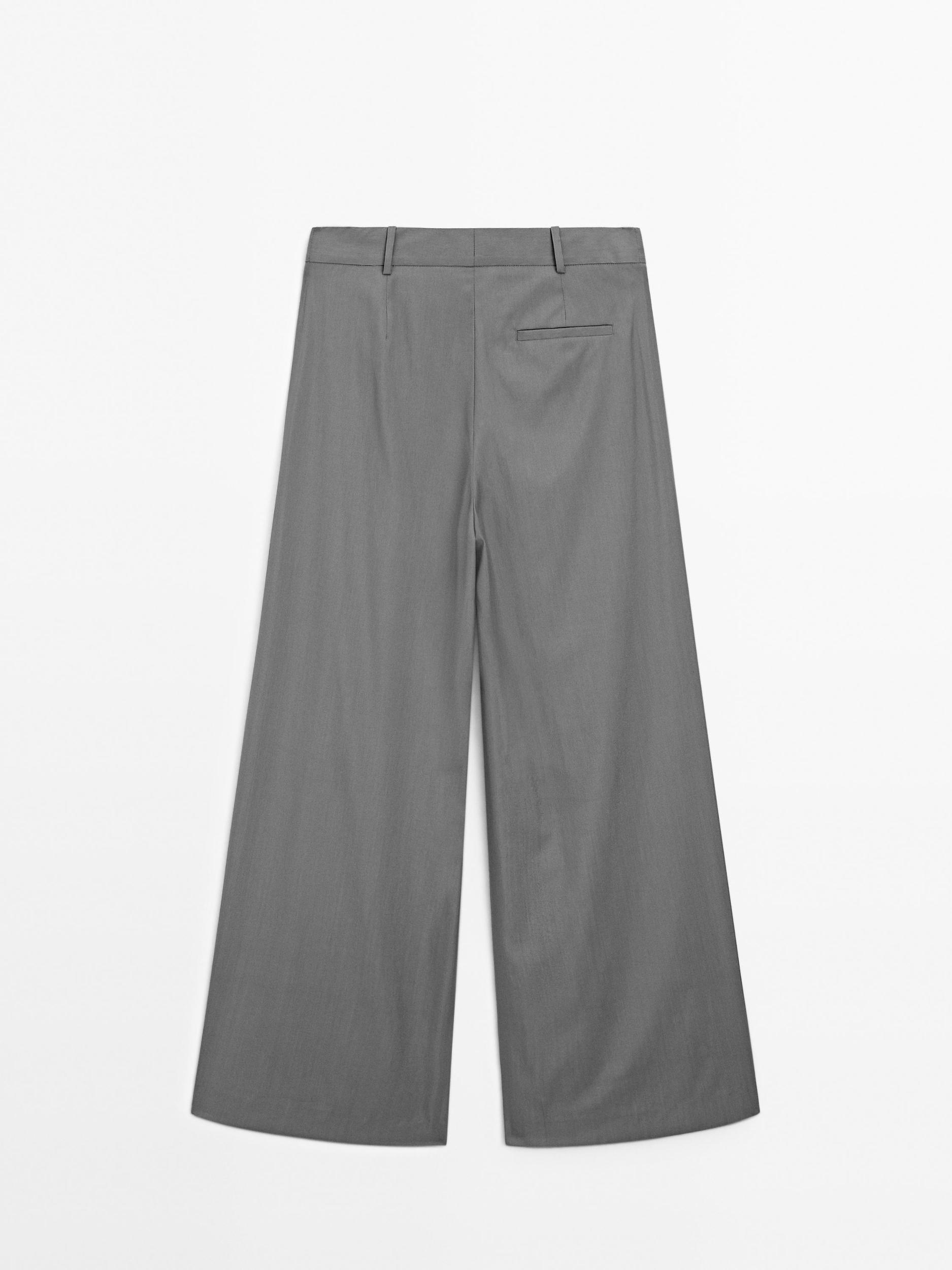 Flowing trousers with darts Product Image