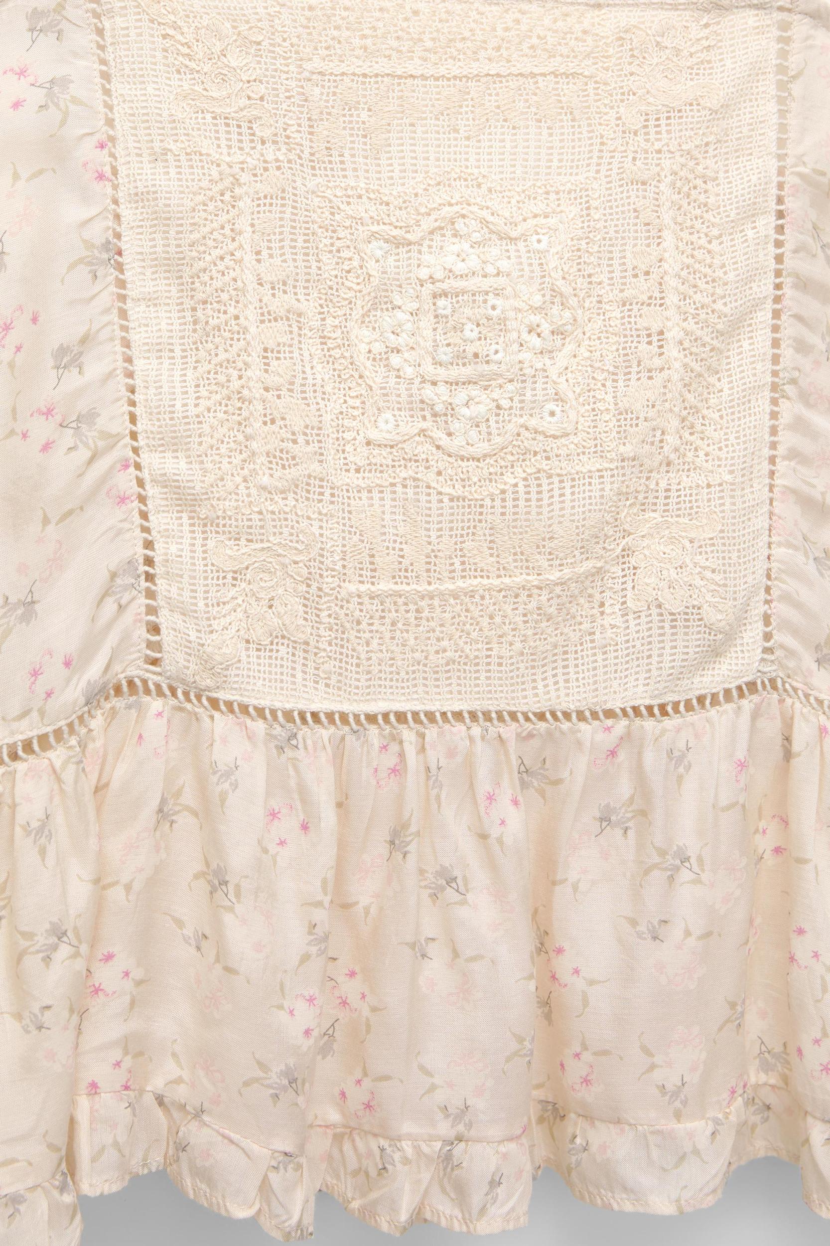 Embroidered floral top Product Image
