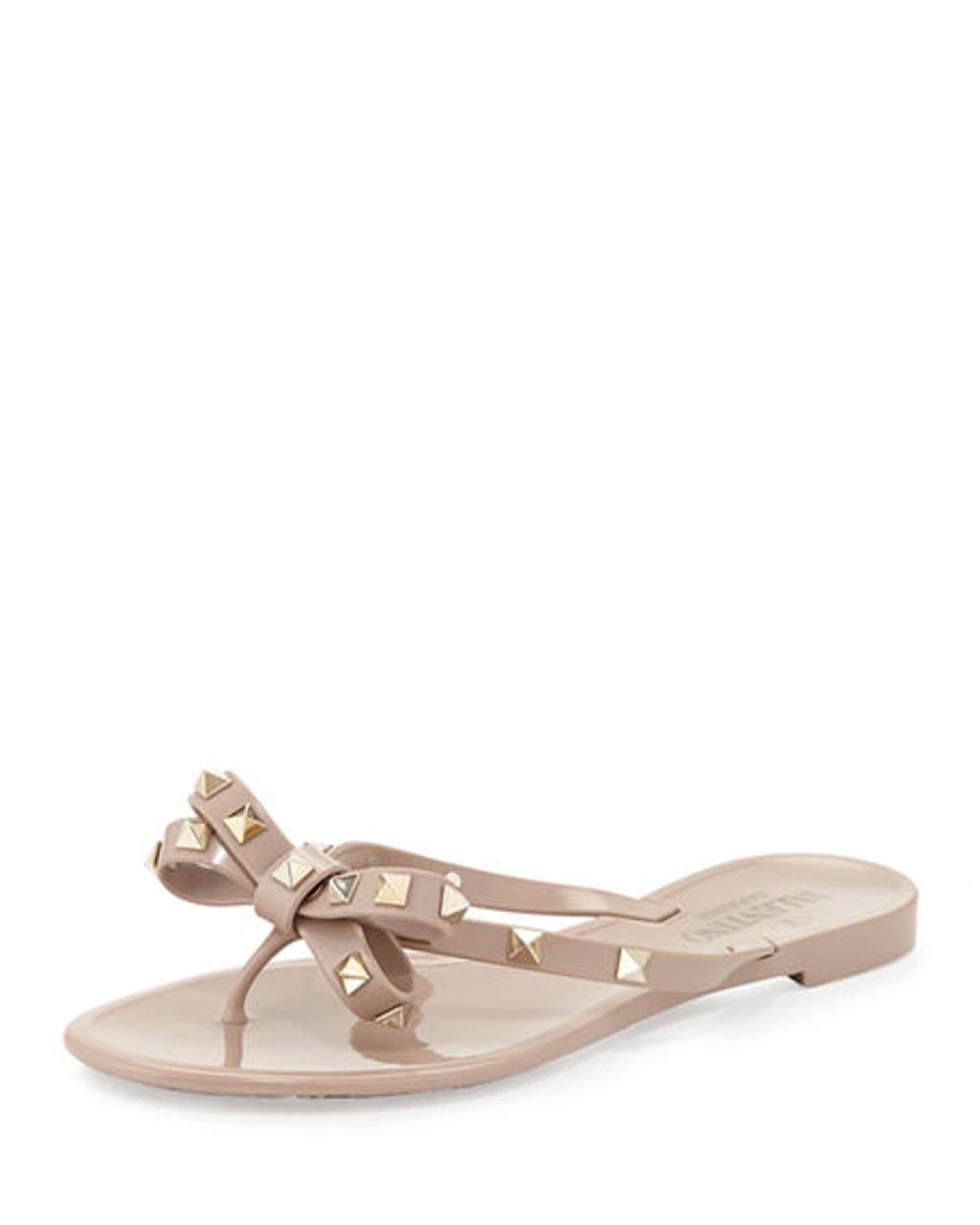 VALENTINO GARAVANI Women Rockstud Rubber Flip Flops In Beige Product Image
