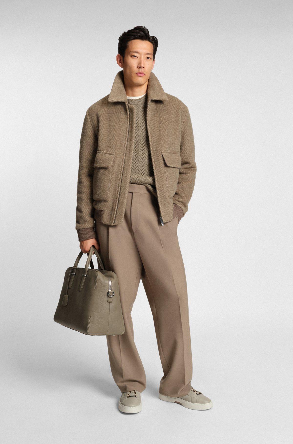 Grained-leather holdall with embossed logo Product Image