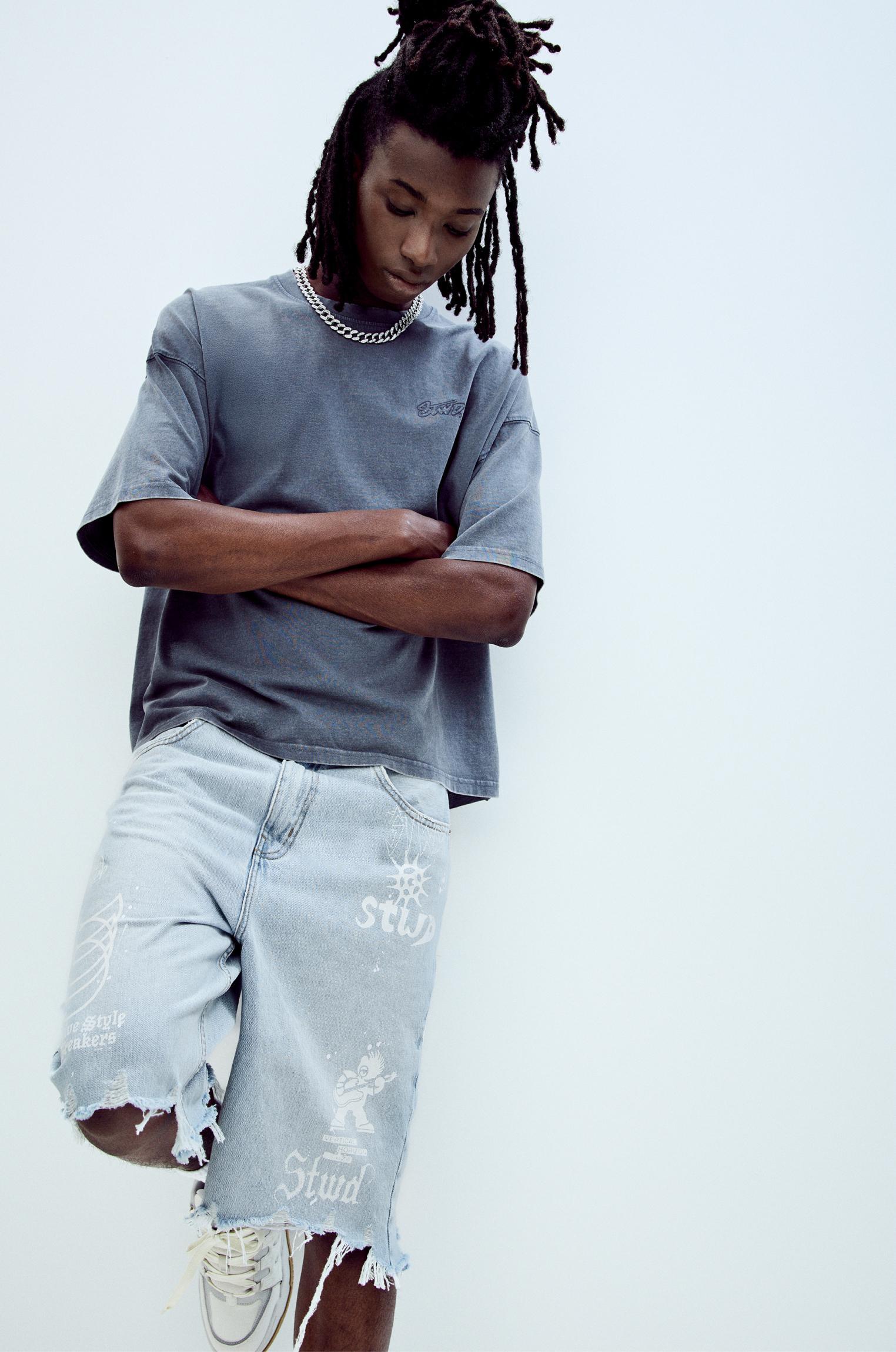 Ripped denim Bermuda shorts Product Image