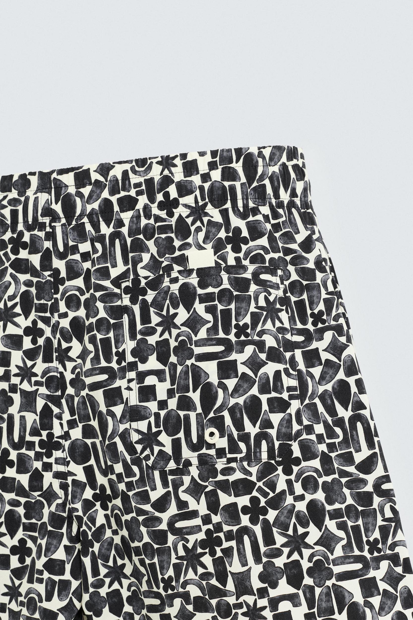 GEOMETRIC PRINT LONG SWIMSUIT Product Image