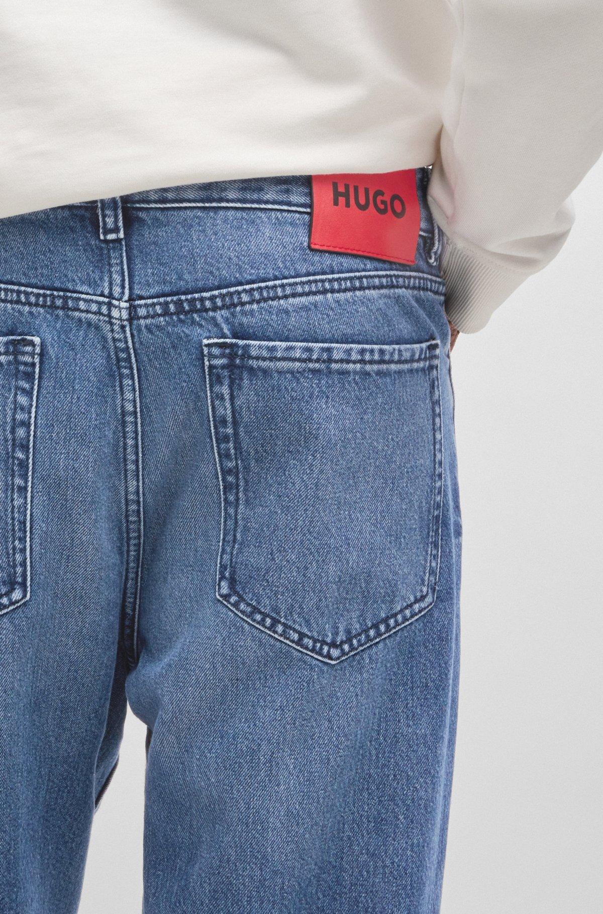 Relaxed tapered-fit jeans in blue vintage-wash denim Product Image