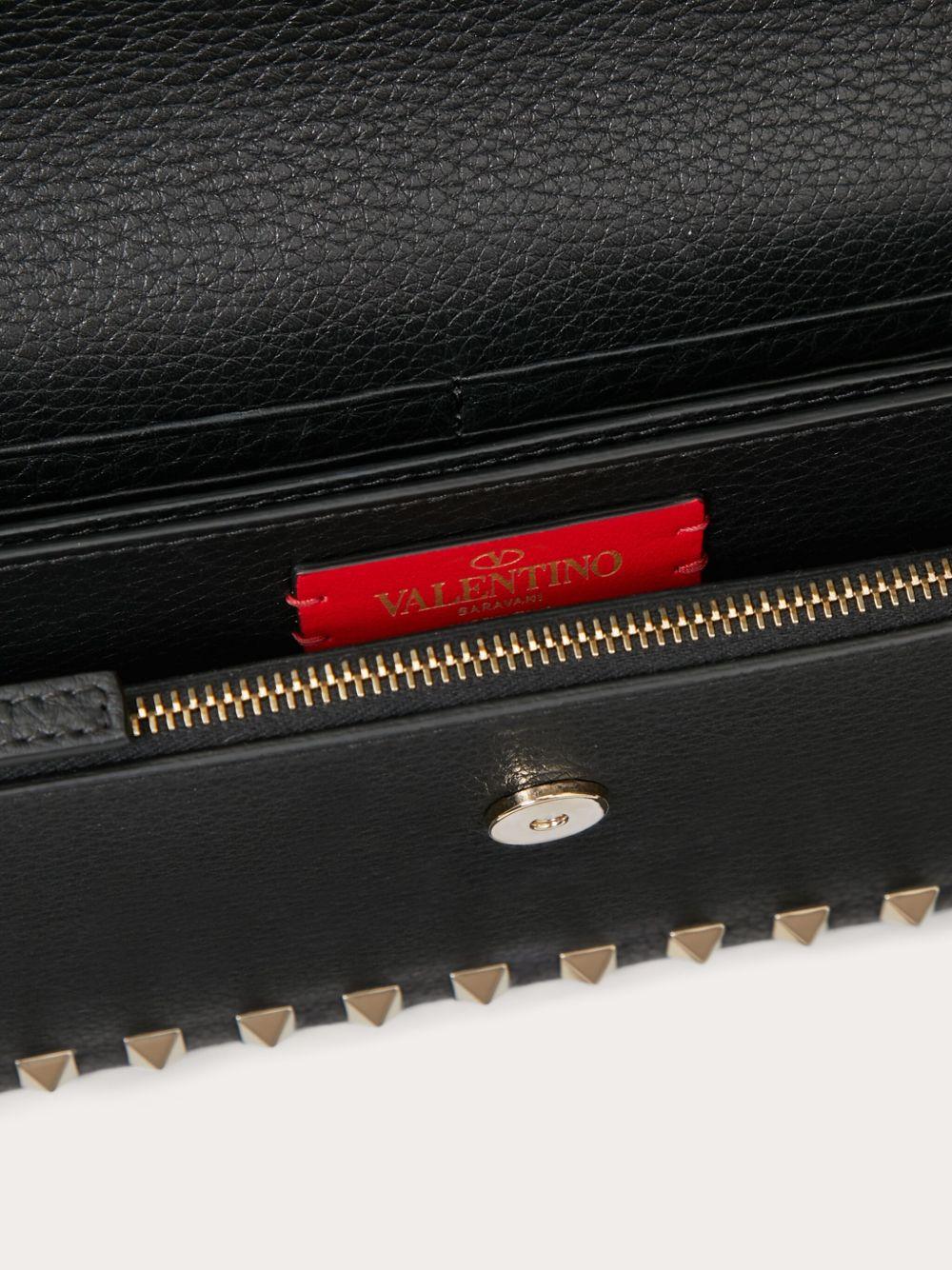 Rockstud leather clutch bag Product Image